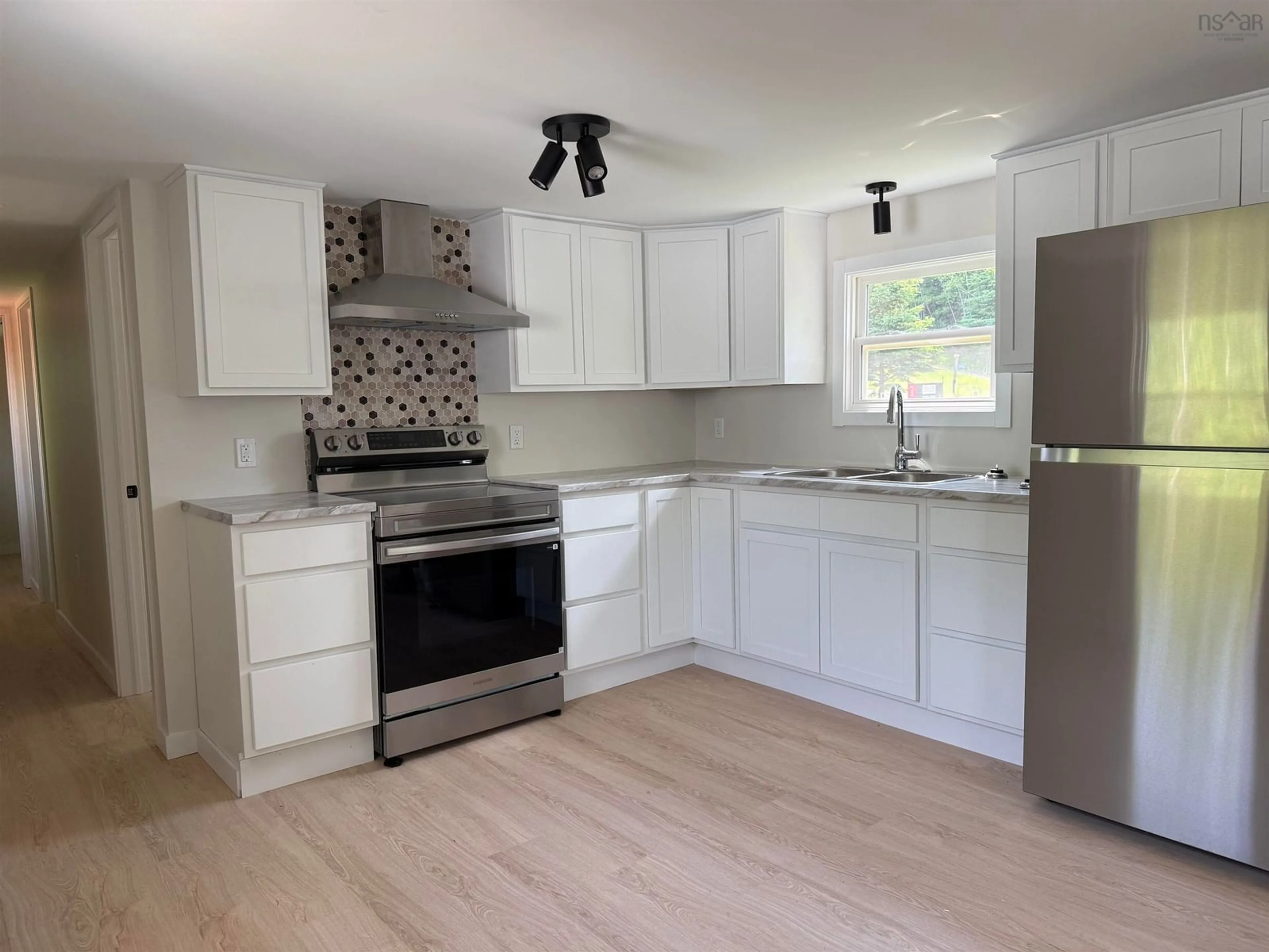 Open concept kitchen, wood/laminate floor for 162 Coldwell Crt, New Minas Nova Scotia B4N 5N3