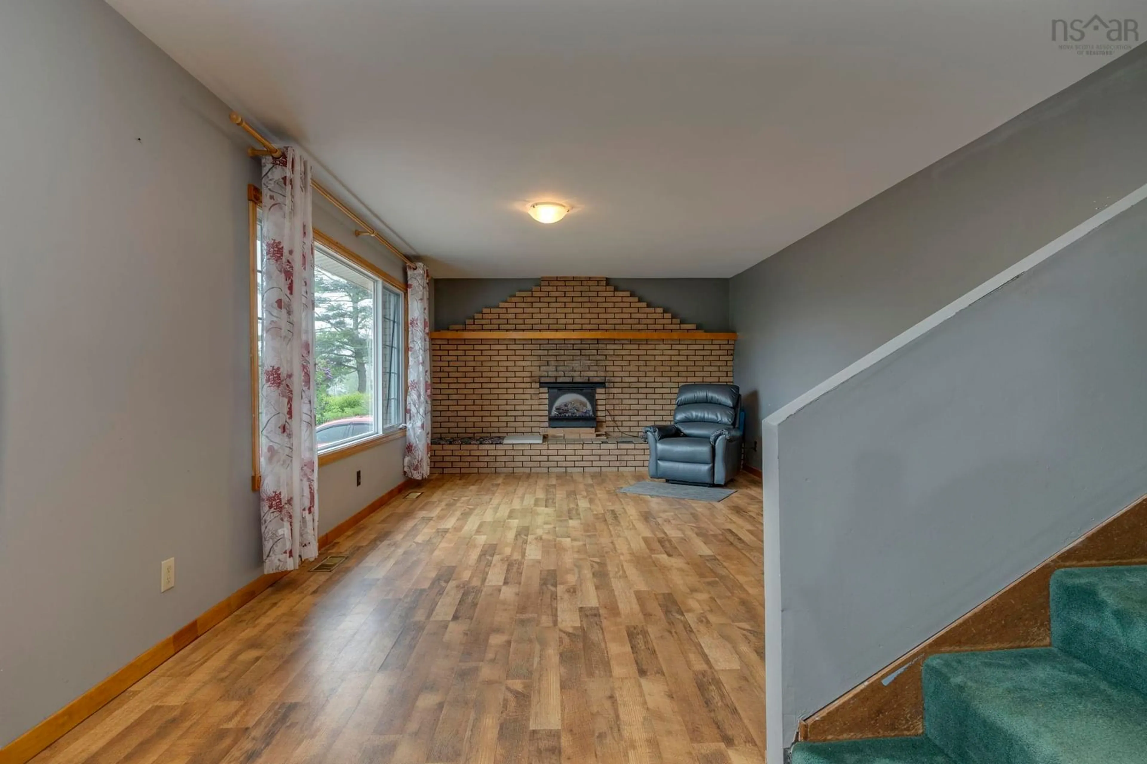 Living room with furniture, wood/laminate floor for 176 Miller Lake Rd, Fall River Nova Scotia B2T 1J5