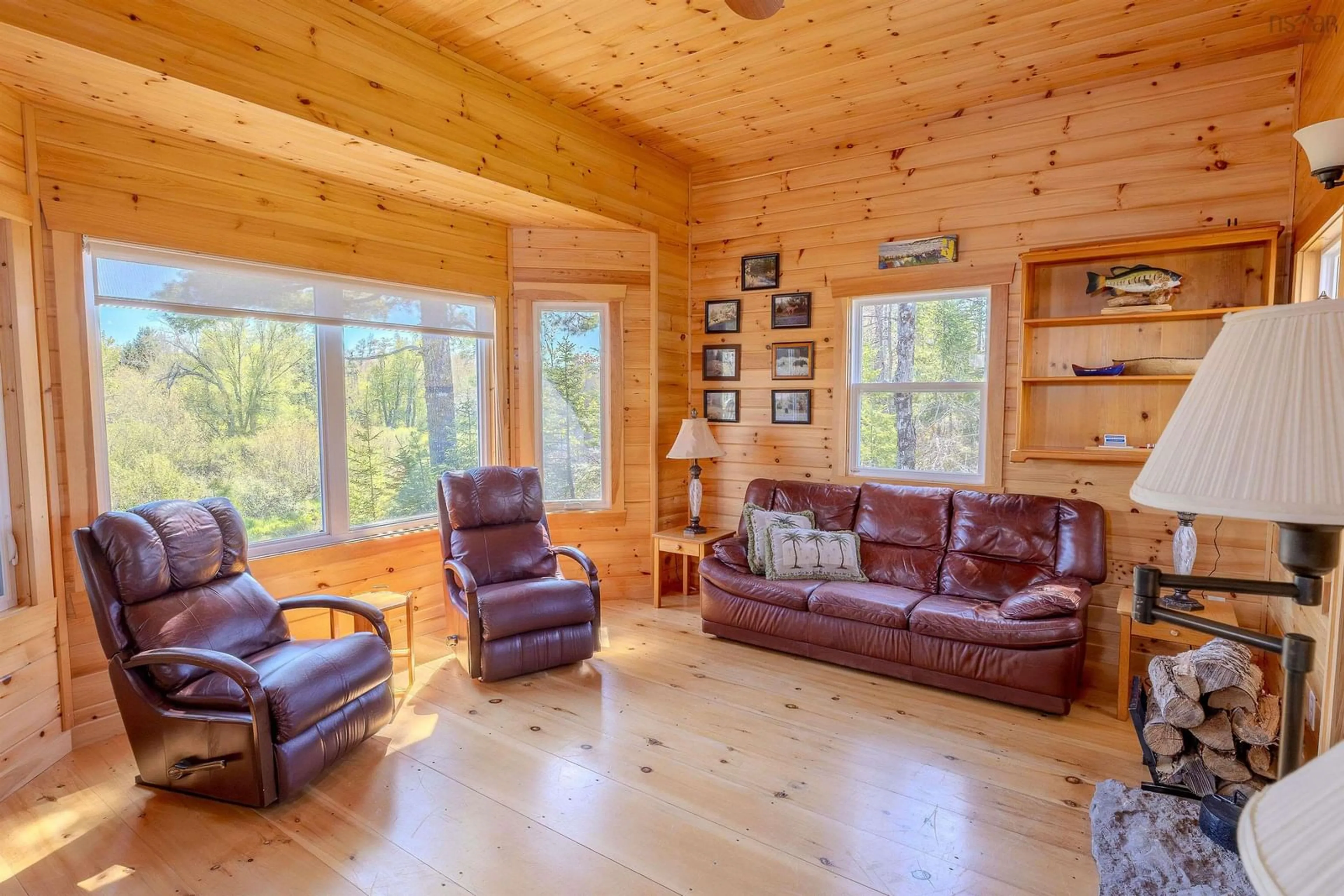Living room with furniture, wood/laminate floor for 26-1 Cameron Settlment Rd, Caledonia Nova Scotia B0H 1E0