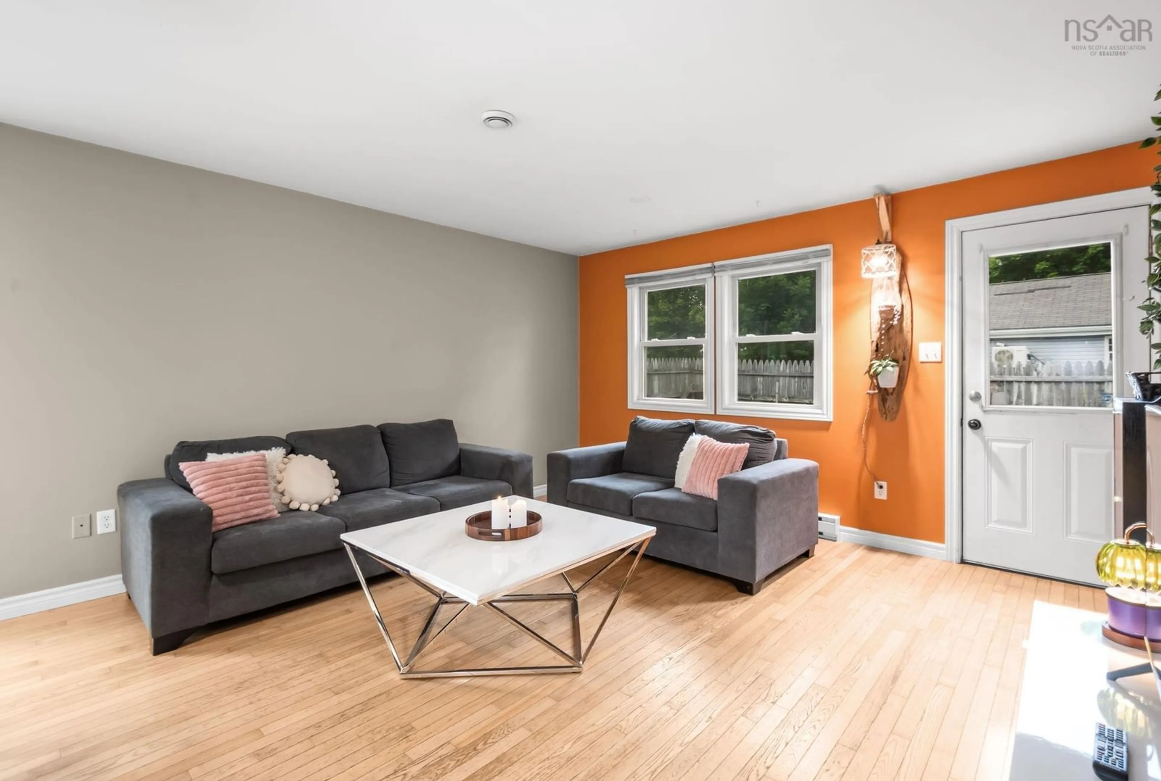 Living room with furniture, wood/laminate floor for 275 Stannus St, Windsor Nova Scotia B0N 2T0