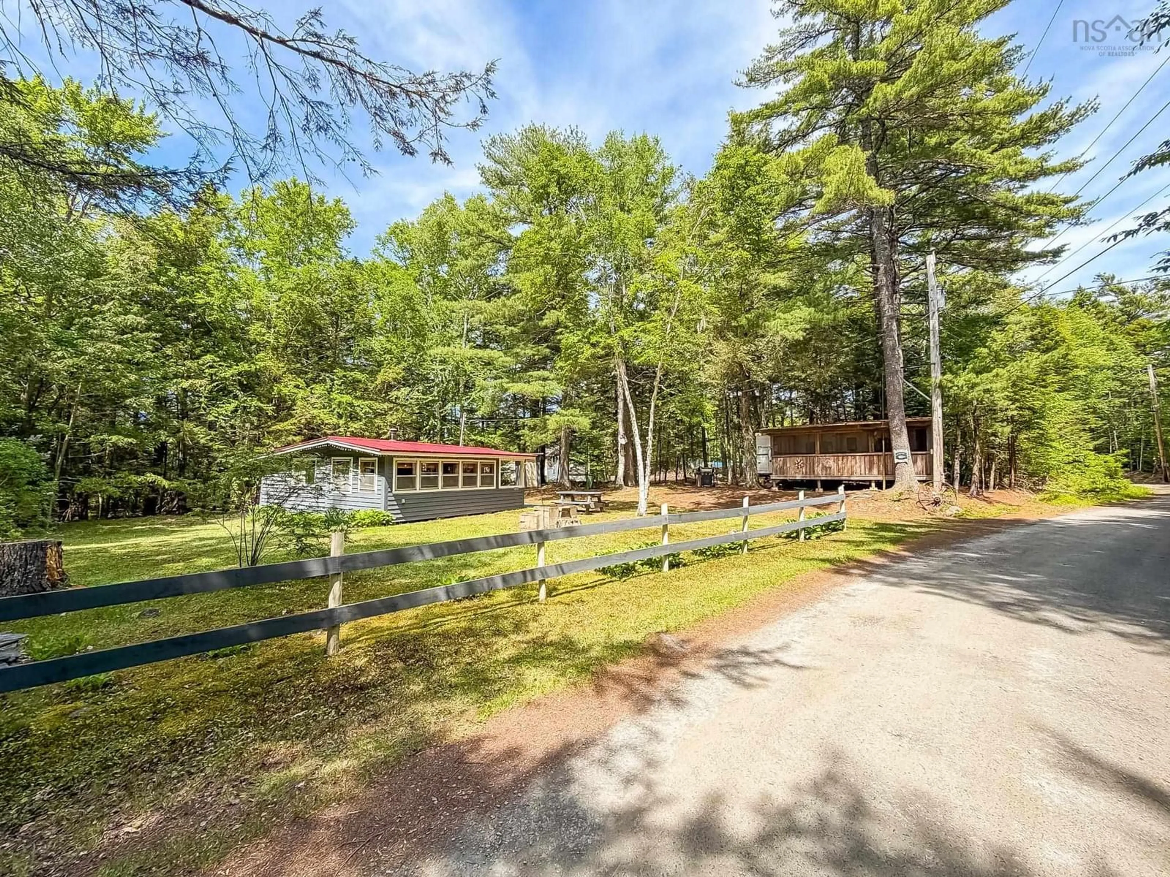A pic from outside/outdoor area/front of a property/back of a property/a pic from drone, forest/trees view for 41 Mill Cove Rd, Molega Lake Nova Scotia B0E 2E0