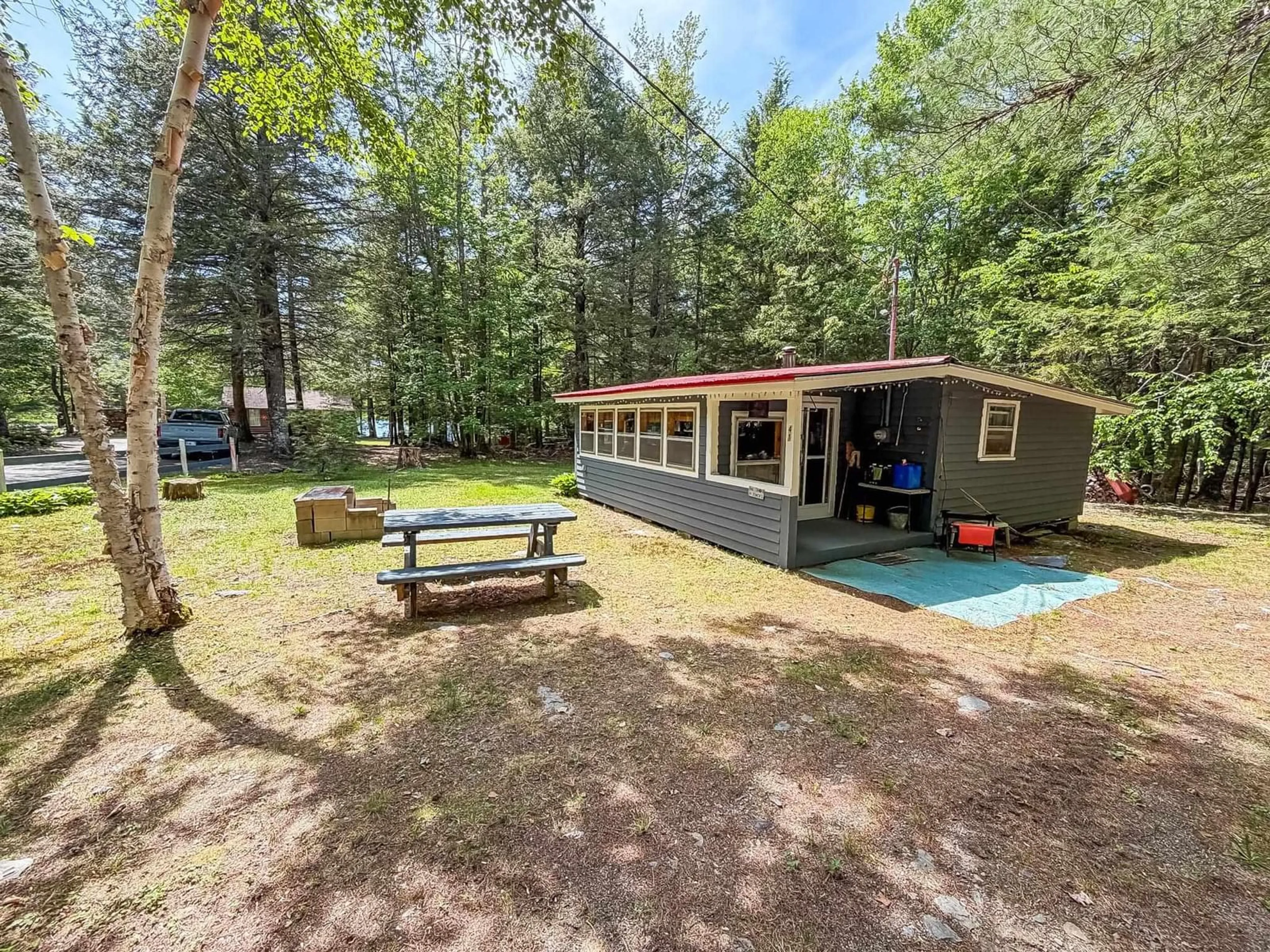 A pic from outside/outdoor area/front of a property/back of a property/a pic from drone, forest/trees view for 41 Mill Cove Rd, Molega Lake Nova Scotia B0E 2E0