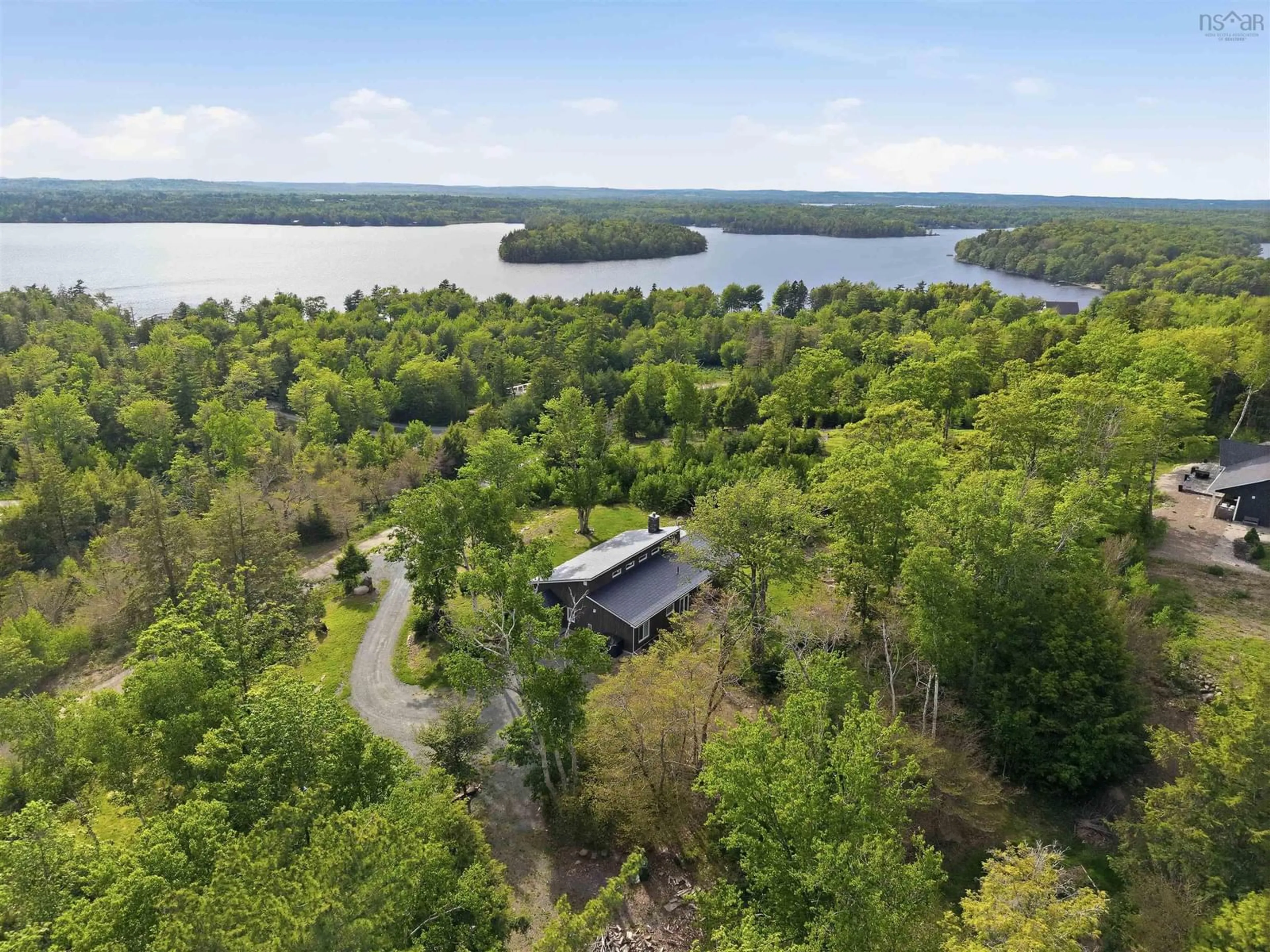 A pic from outside/outdoor area/front of a property/back of a property/a pic from drone, water/lake/river/ocean view for 45 River Mill Terr, Conquerall Mills Nova Scotia B4V 9H6