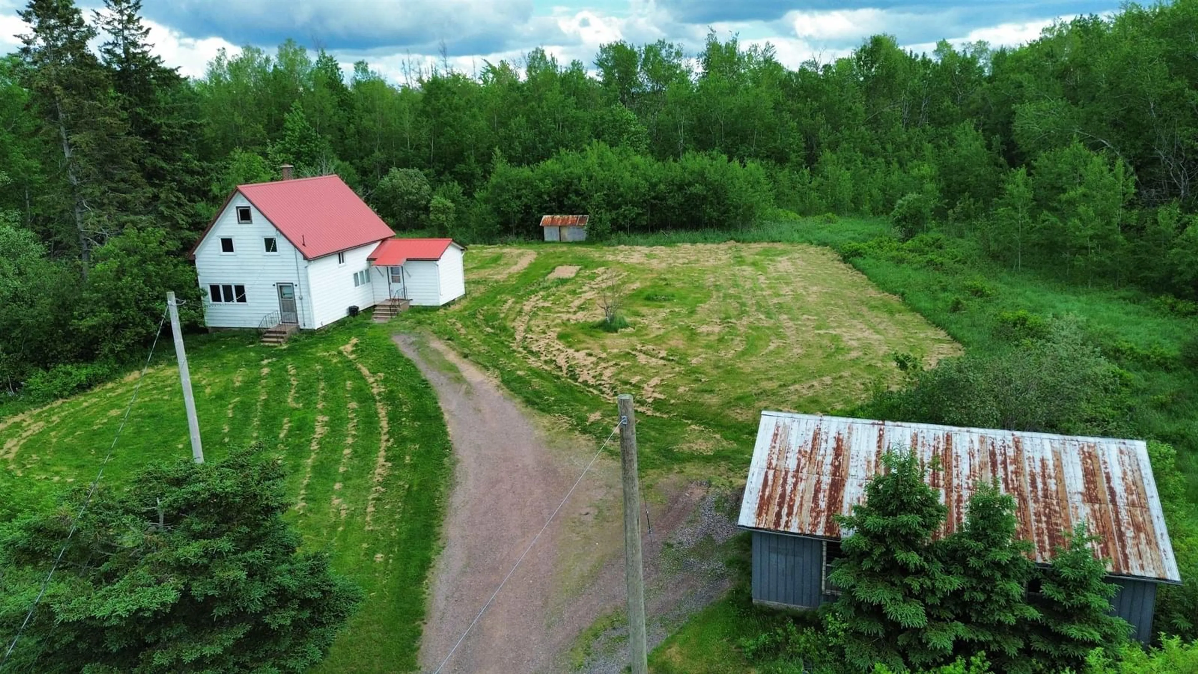 A pic from outside/outdoor area/front of a property/back of a property/a pic from drone, unknown for 9902 204 Hwy, South Victoria Nova Scotia B0M 1P0
