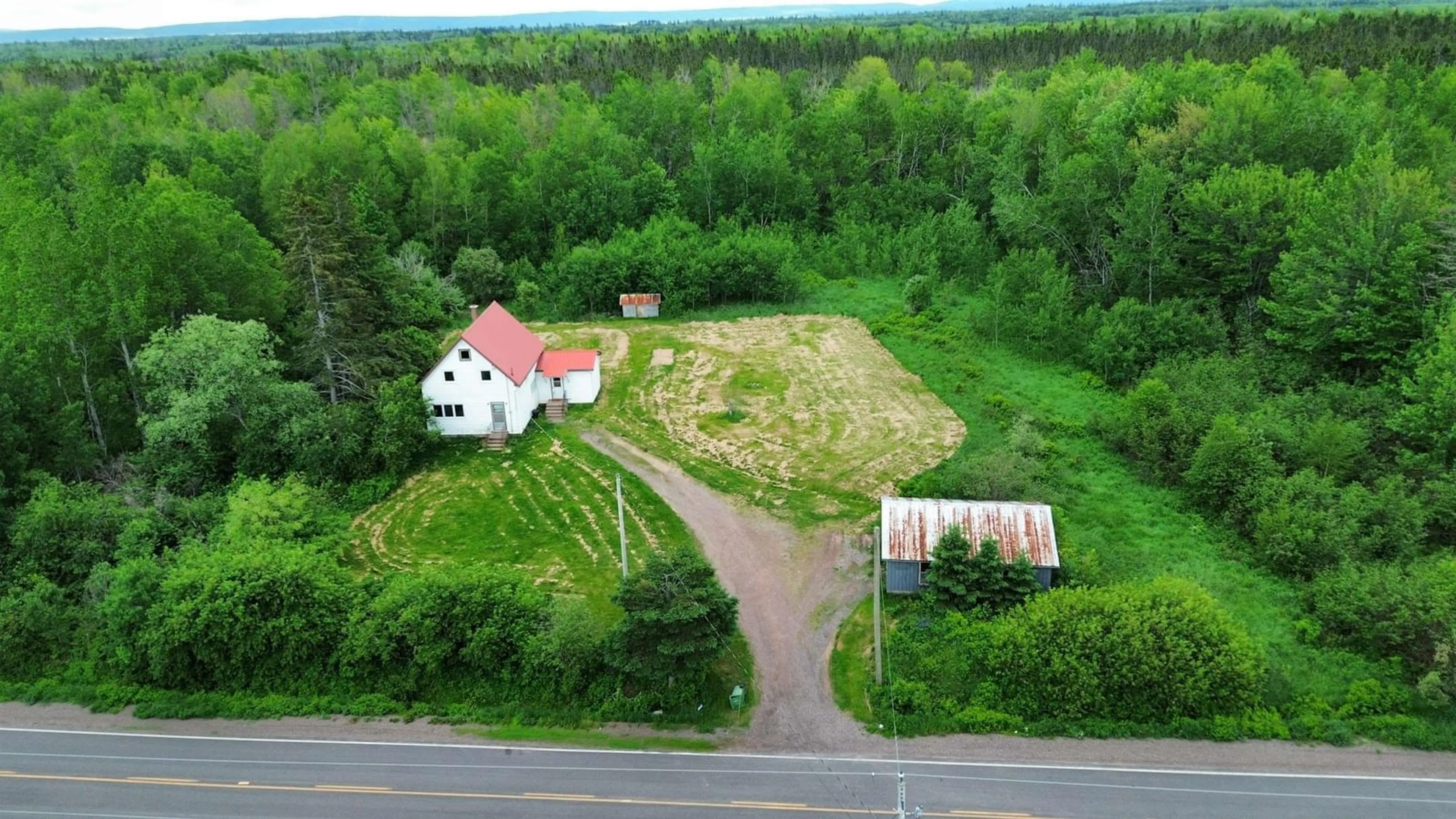 A pic from outside/outdoor area/front of a property/back of a property/a pic from drone, unknown for 9902 204 Hwy, South Victoria Nova Scotia B0M 1P0