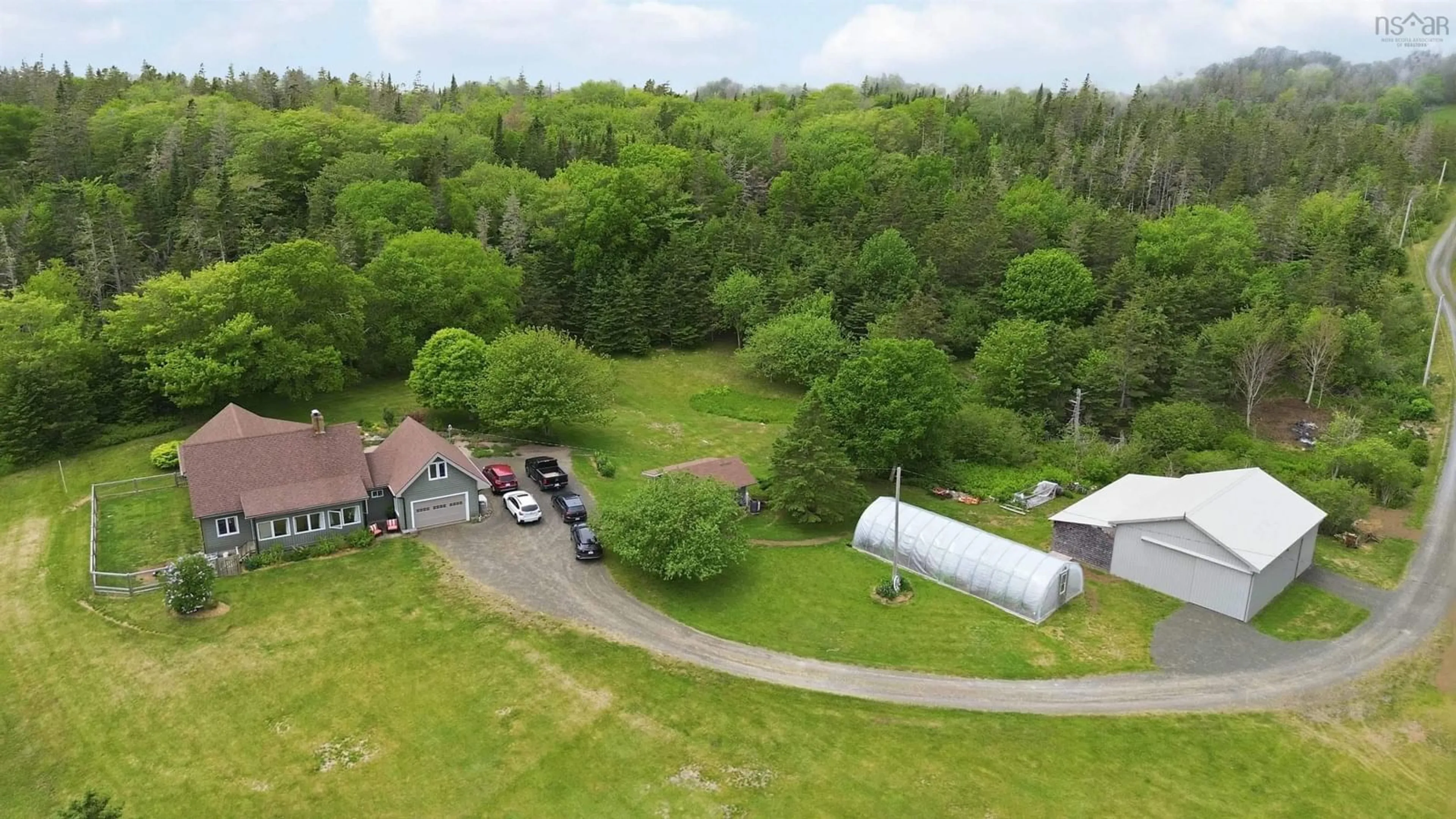 A pic from outside/outdoor area/front of a property/back of a property/a pic from drone, unknown for 7130 Highway 217, Lake Midway Nova Scotia B0V 1A0