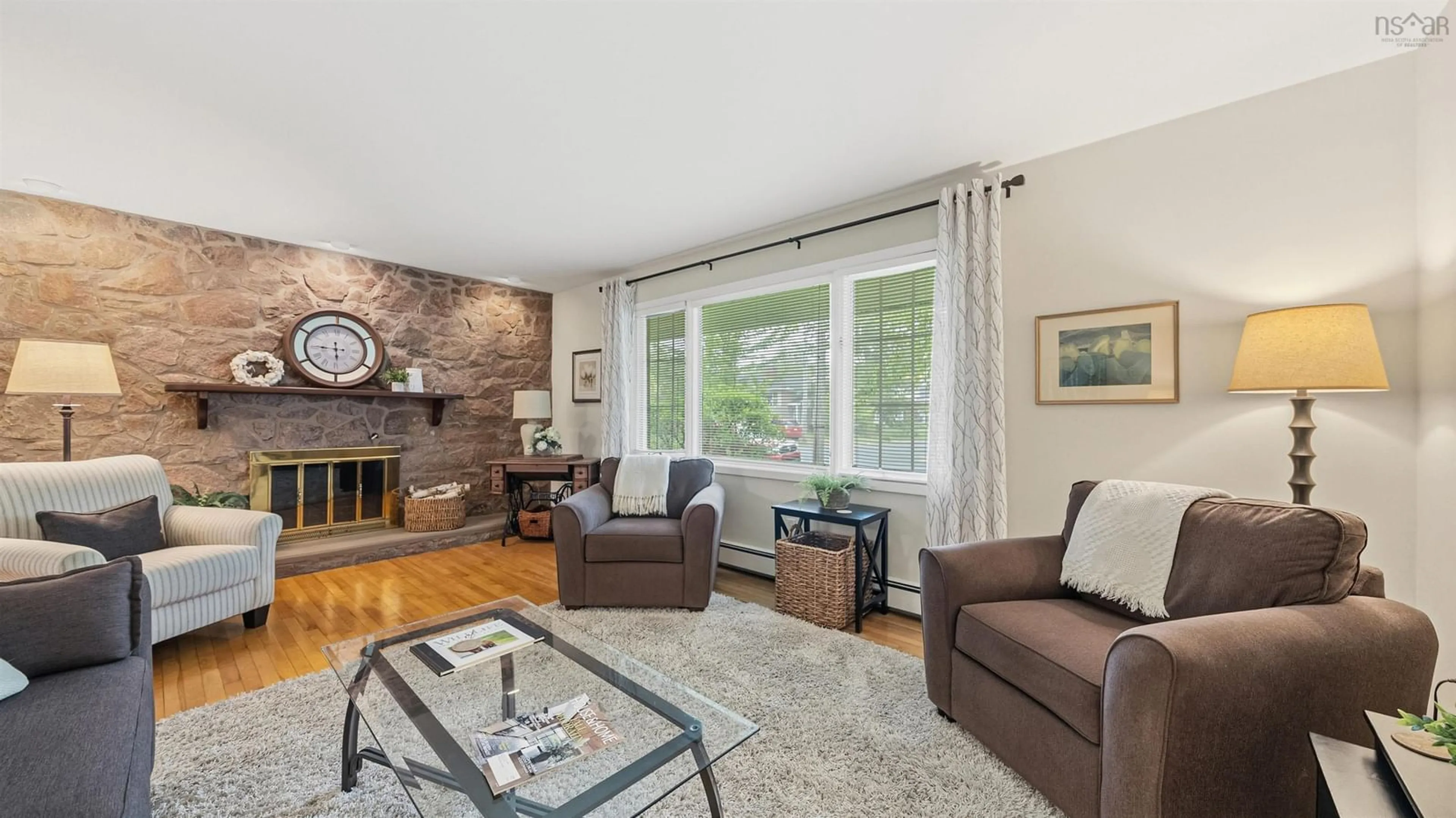 Living room with furniture, wood/laminate floor for 17 Guy St, Dartmouth Nova Scotia B3A 2P4