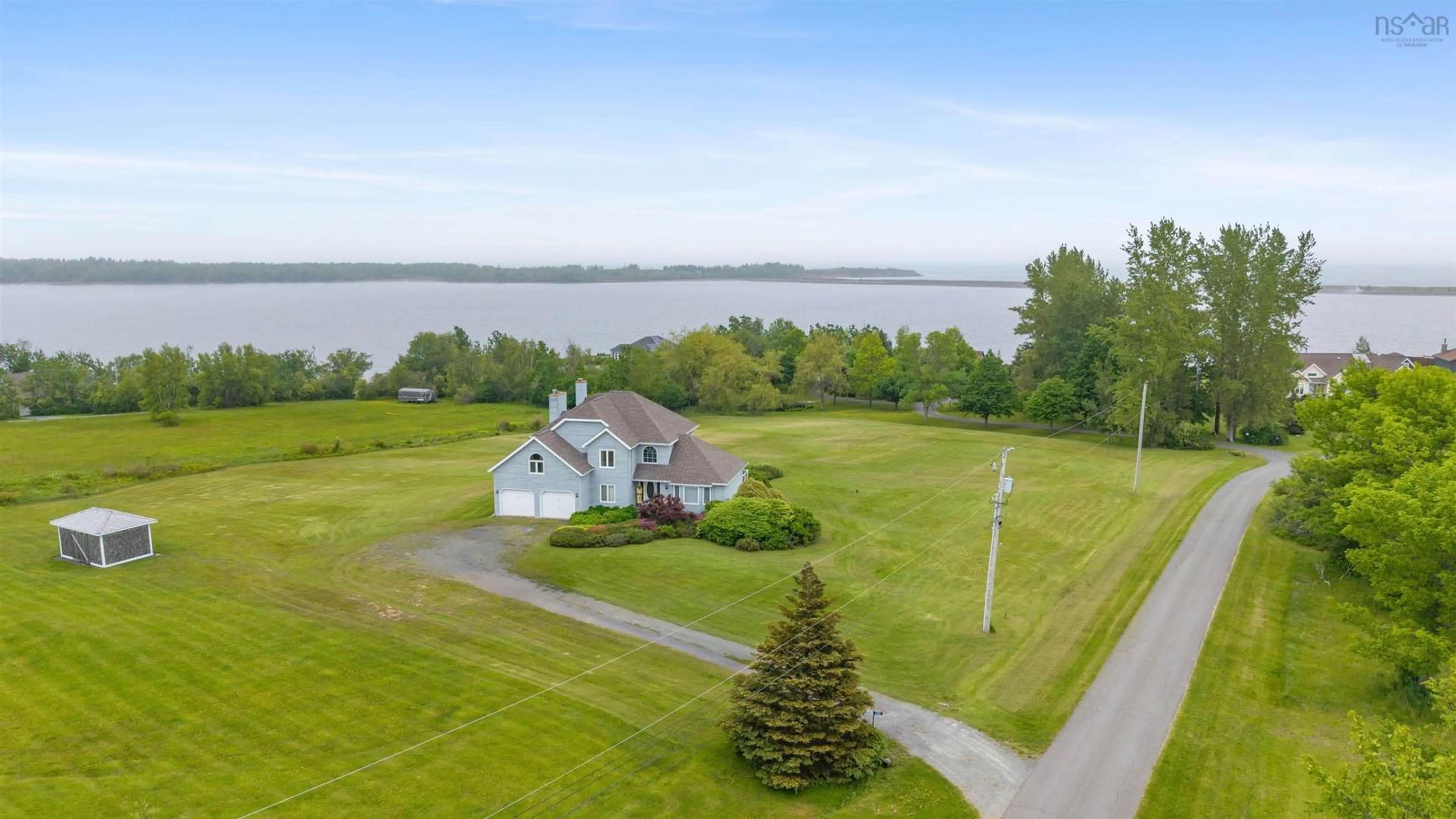 A pic from outside/outdoor area/front of a property/back of a property/a pic from drone, water/lake/river/ocean view for 103 Sea Oats Dr, Kings Head Nova Scotia B2H 5C4