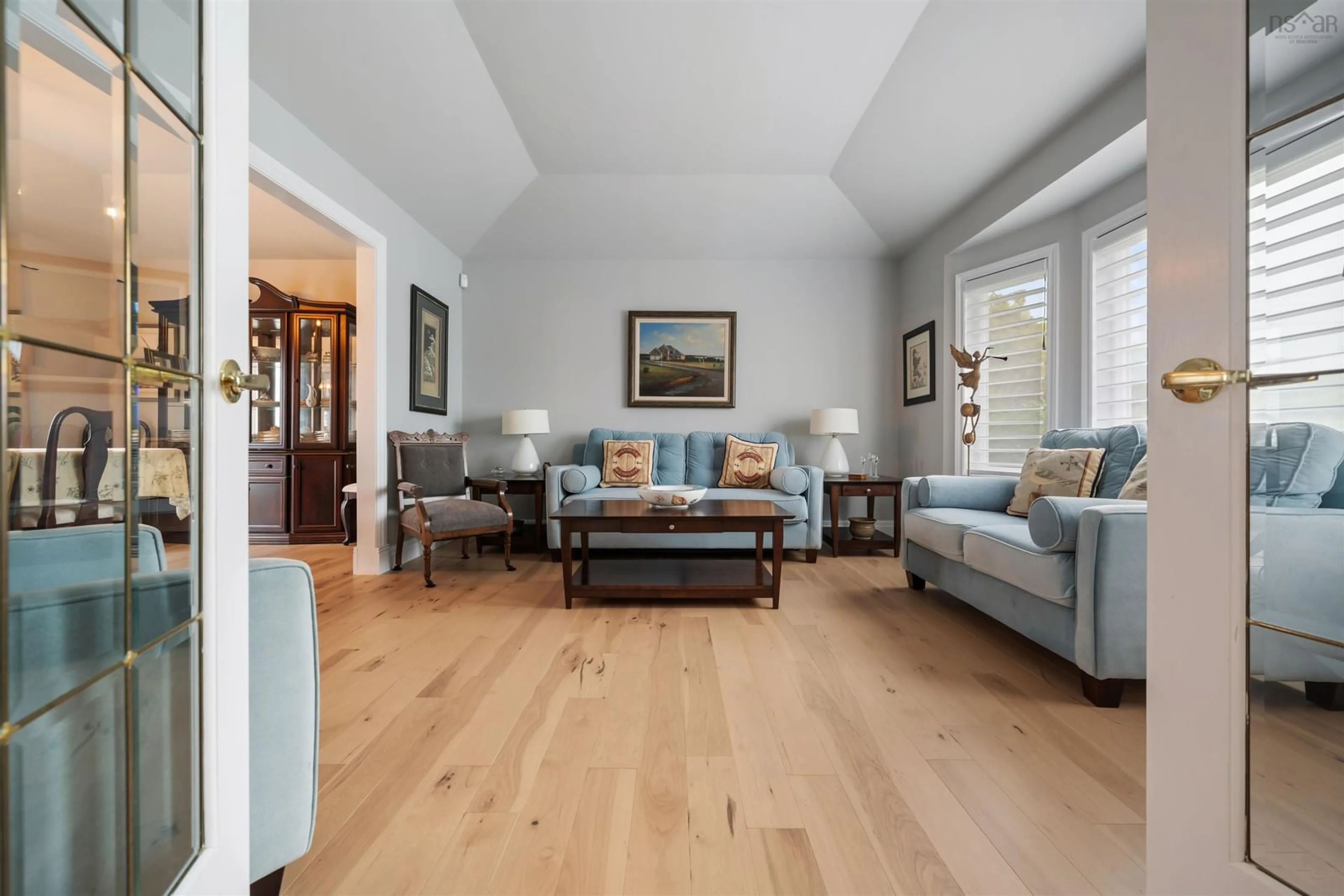 Living room with furniture, wood/laminate floor for 103 Sea Oats Dr, Kings Head Nova Scotia B2H 5C4