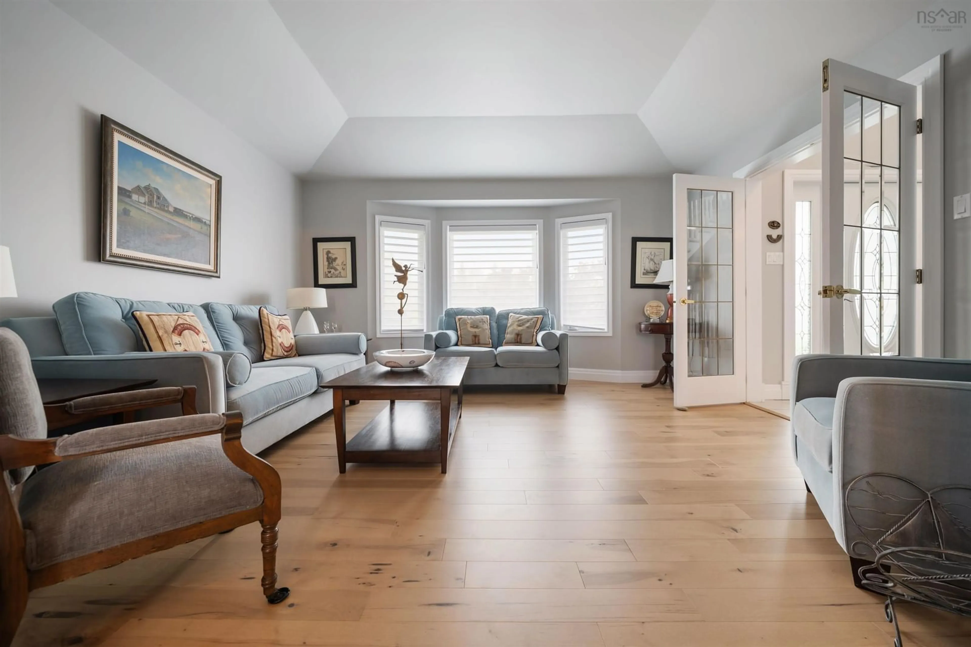 Living room with furniture, wood/laminate floor for 103 Sea Oats Dr, Kings Head Nova Scotia B2H 5C4