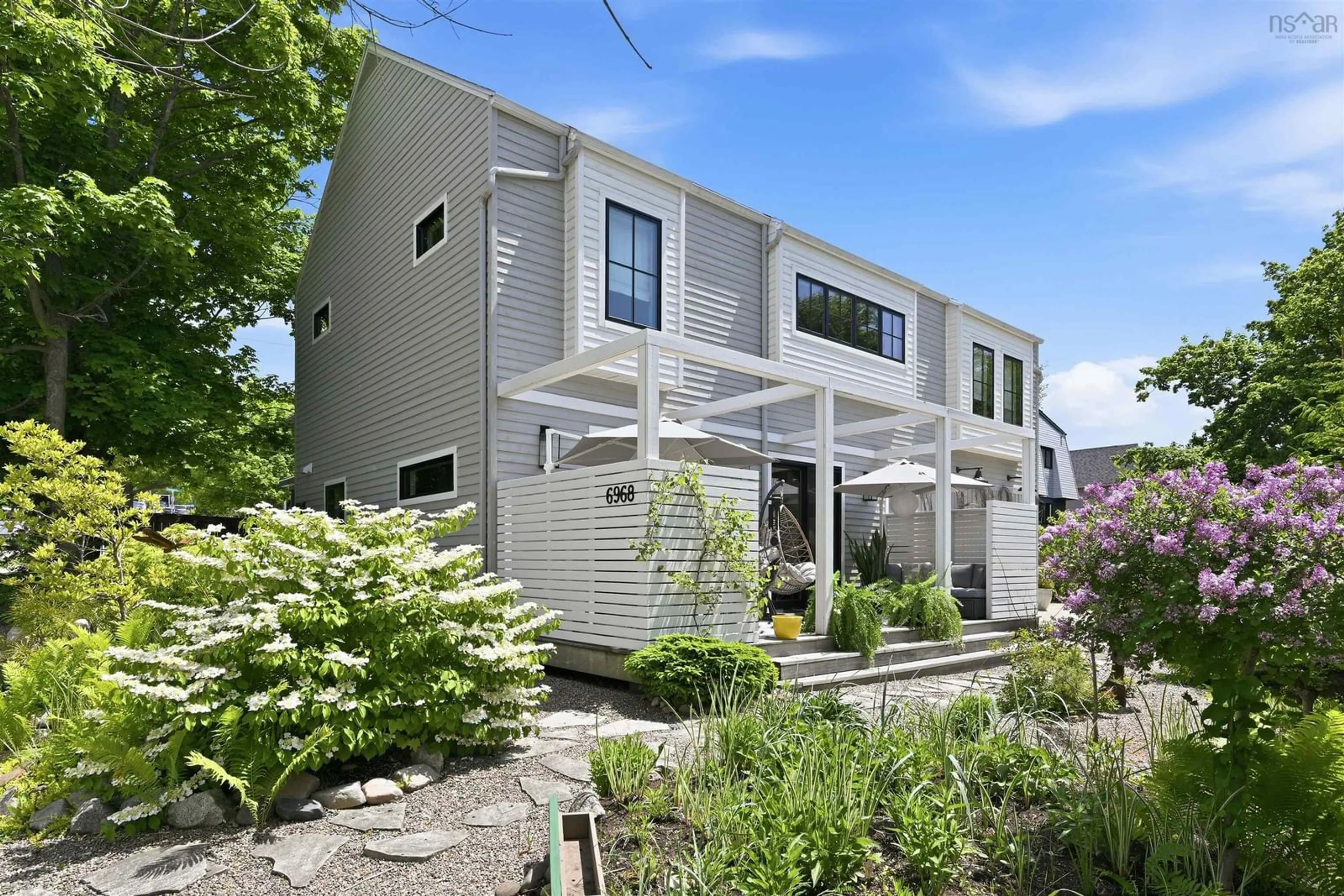 Home with vinyl exterior material, street for 6968 Chebucto Rd, Halifax Nova Scotia B3L 1M7
