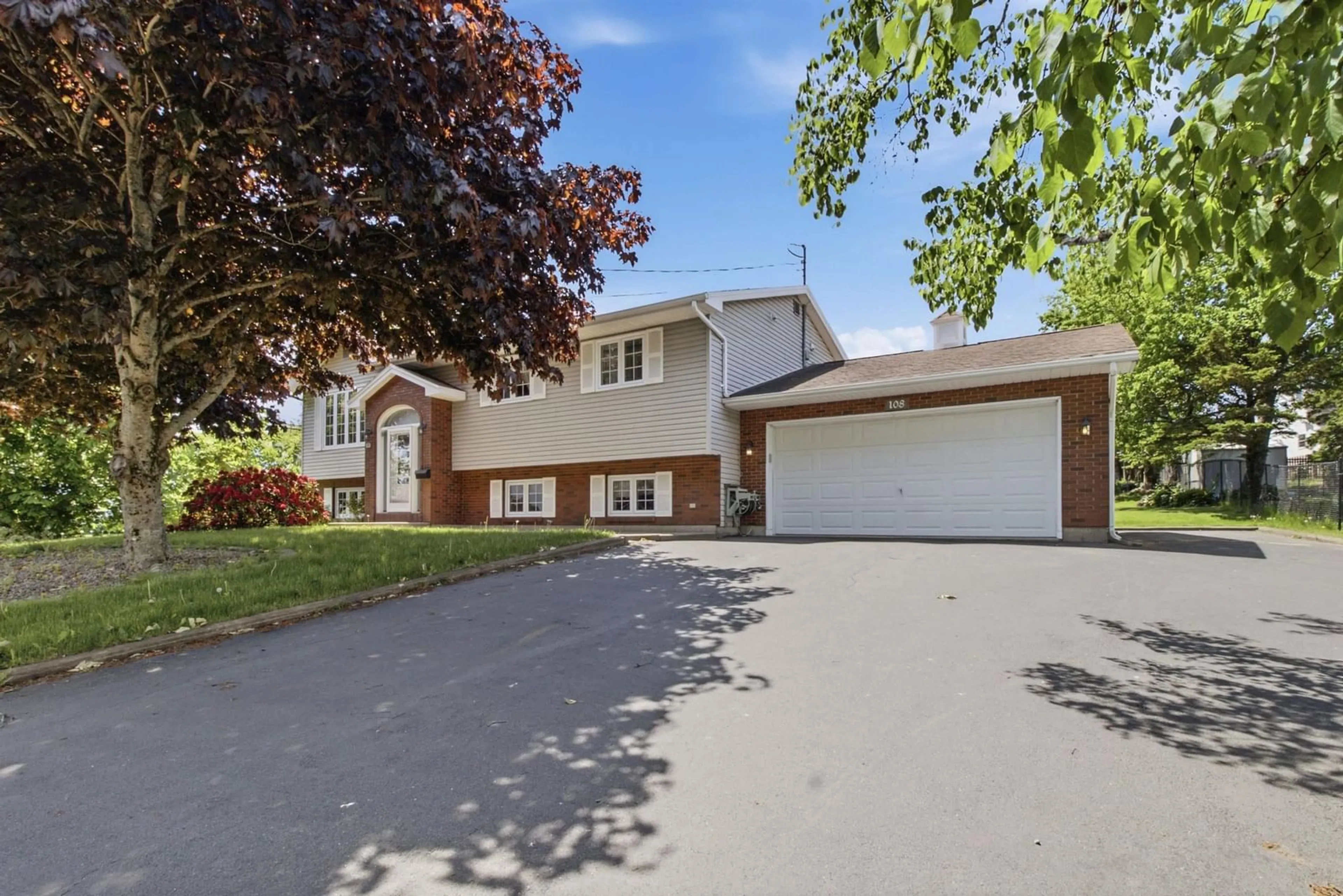 Home with vinyl exterior material, street for 108 Stratford Dr, Cole Harbour Nova Scotia B2V 2R2