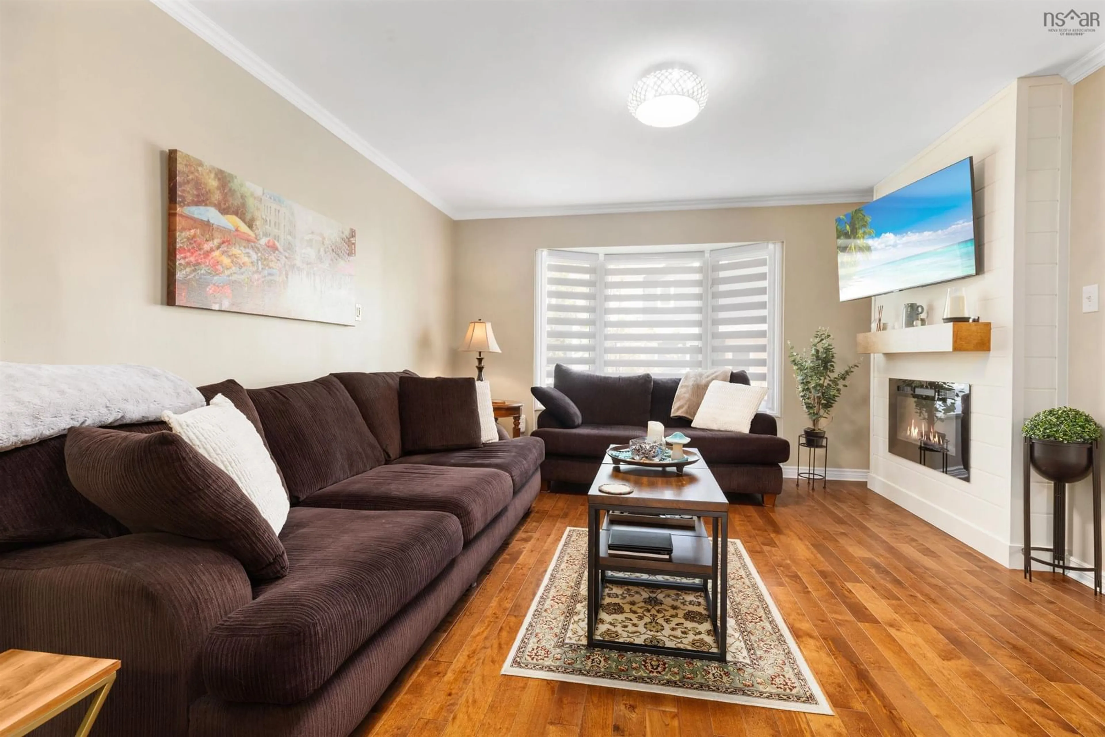 Living room with furniture, wood/laminate floor for 74 Attenborough Crt, Halifax Nova Scotia B3M 4C2