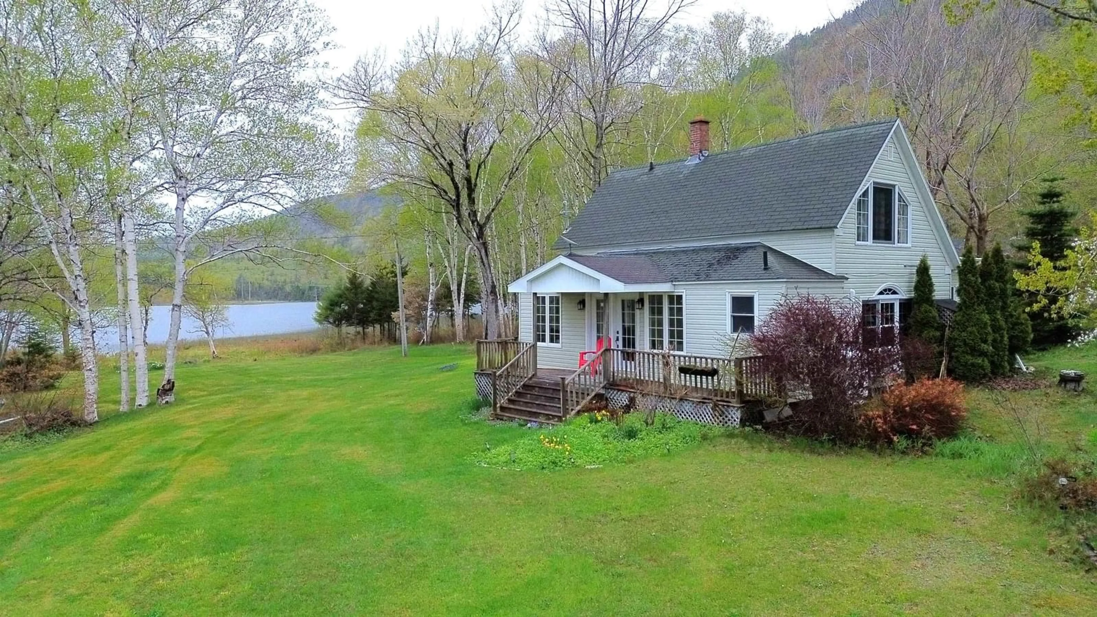 A pic from outside/outdoor area/front of a property/back of a property/a pic from drone, water/lake/river/ocean view for 45478 Cabot Trail, Indian Brook Nova Scotia B0C 1H0