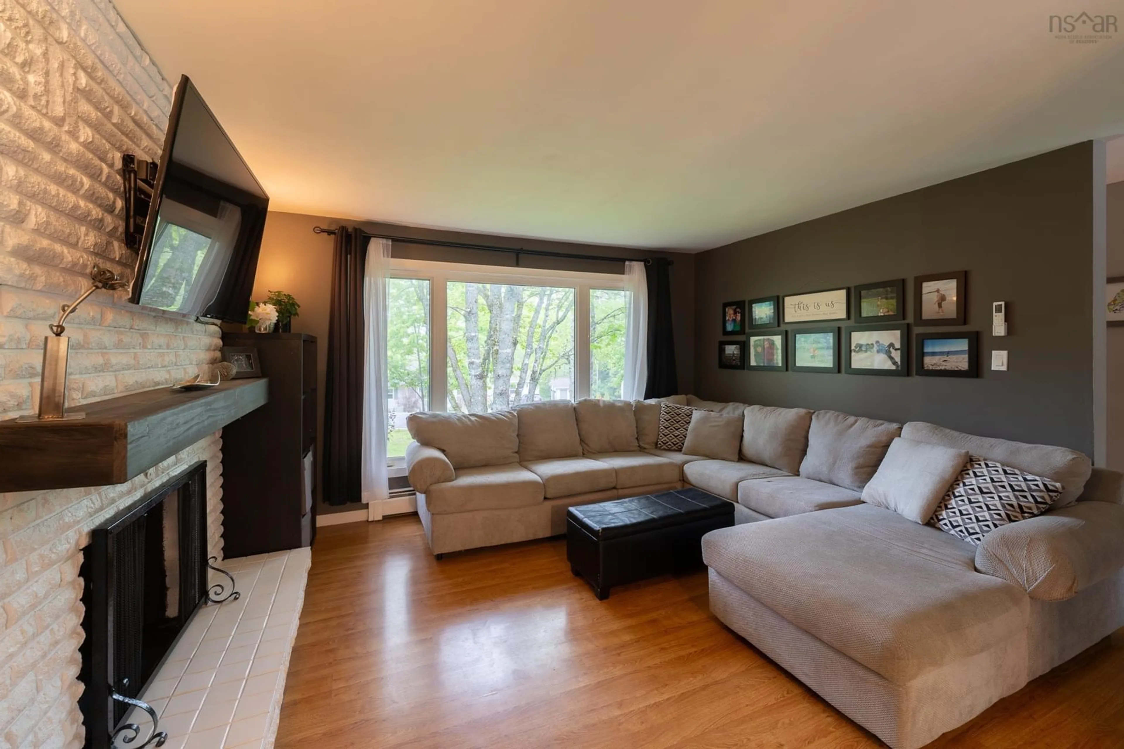 Living room with furniture, wood/laminate floor for 69 Forest Village Rd, Simms Settlement Nova Scotia B0J 1T0