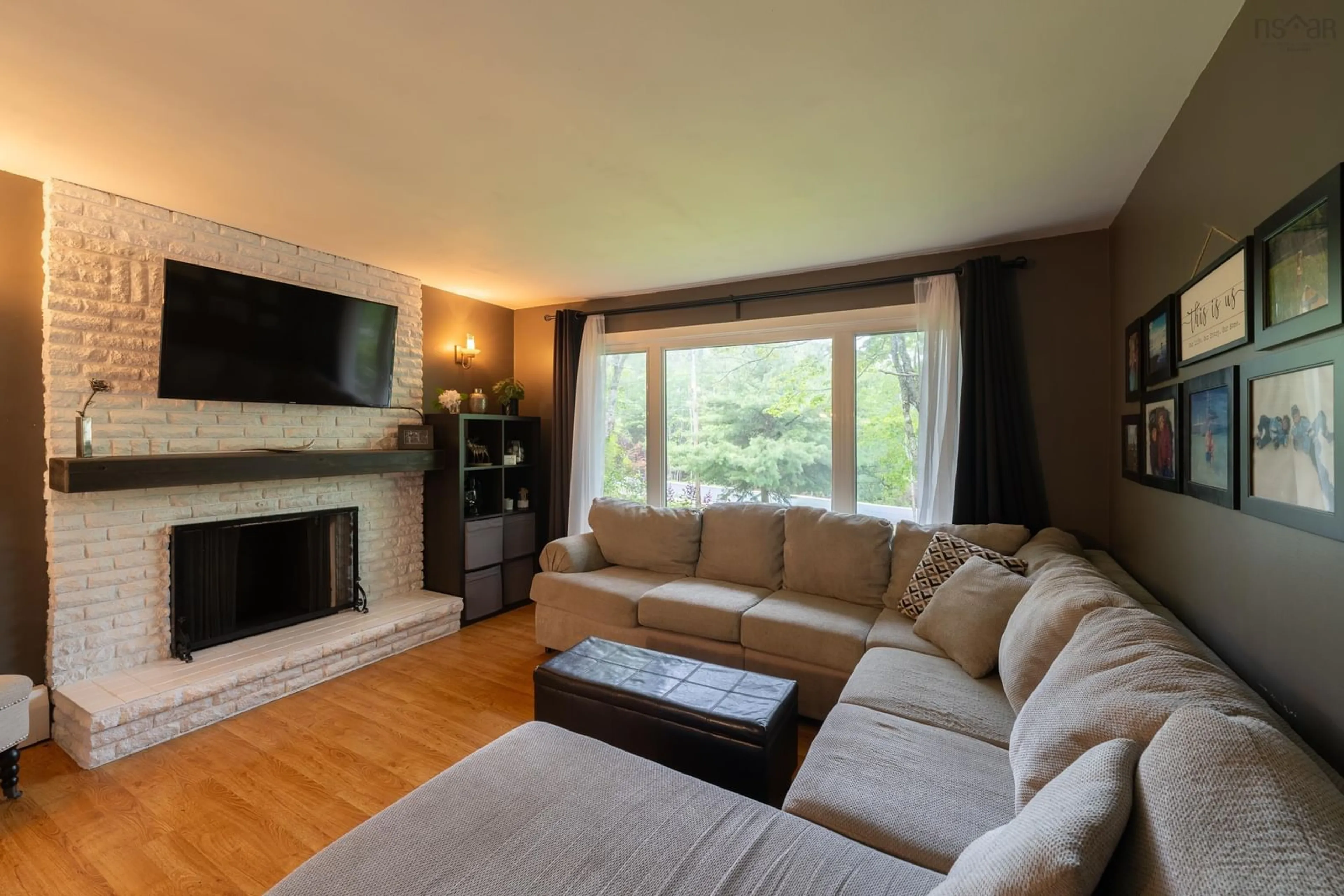 Living room with furniture, wood/laminate floor for 69 Forest Village Rd, Simms Settlement Nova Scotia B0J 1T0