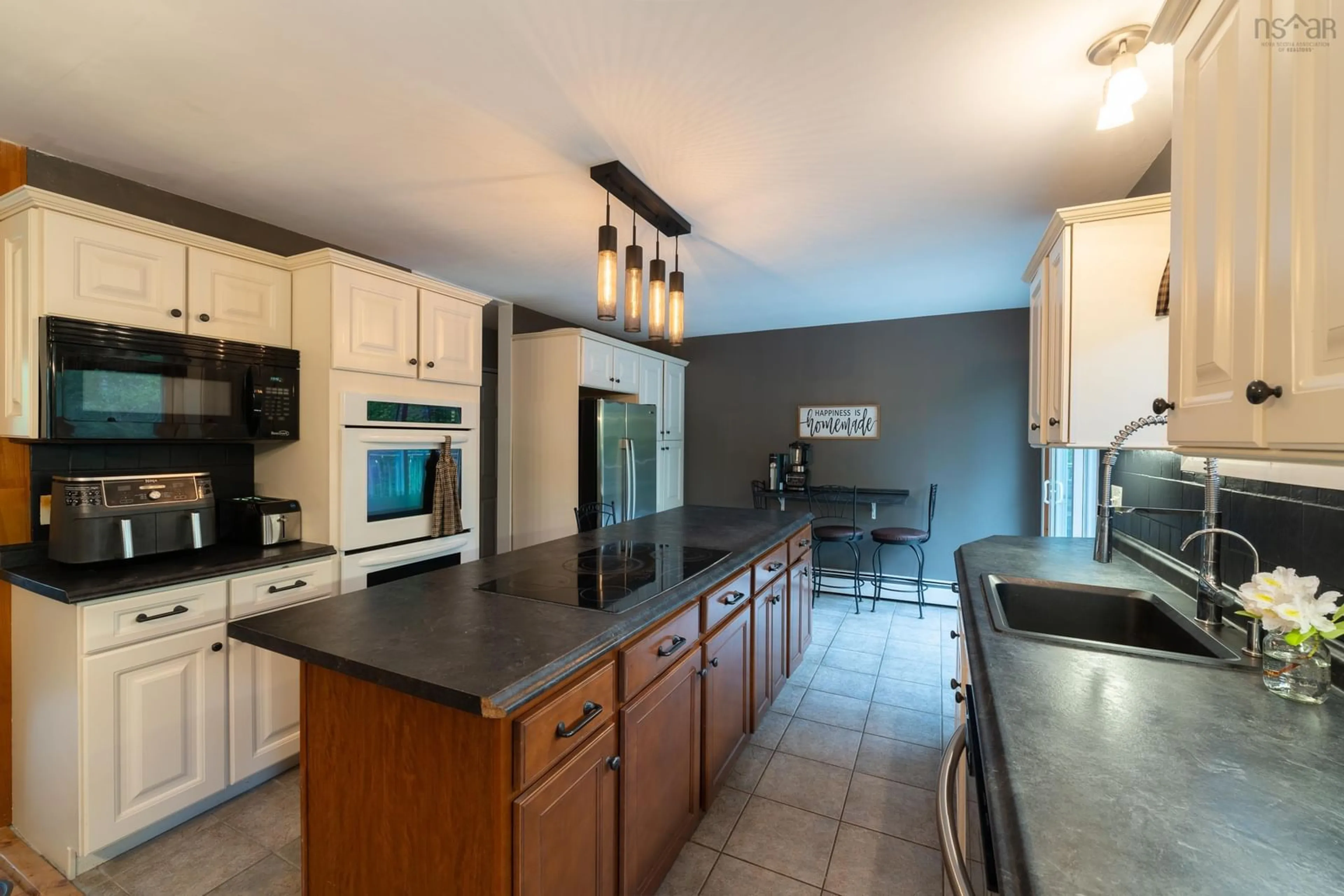 Open concept kitchen, ceramic/tile floor for 69 Forest Village Rd, Simms Settlement Nova Scotia B0J 1T0