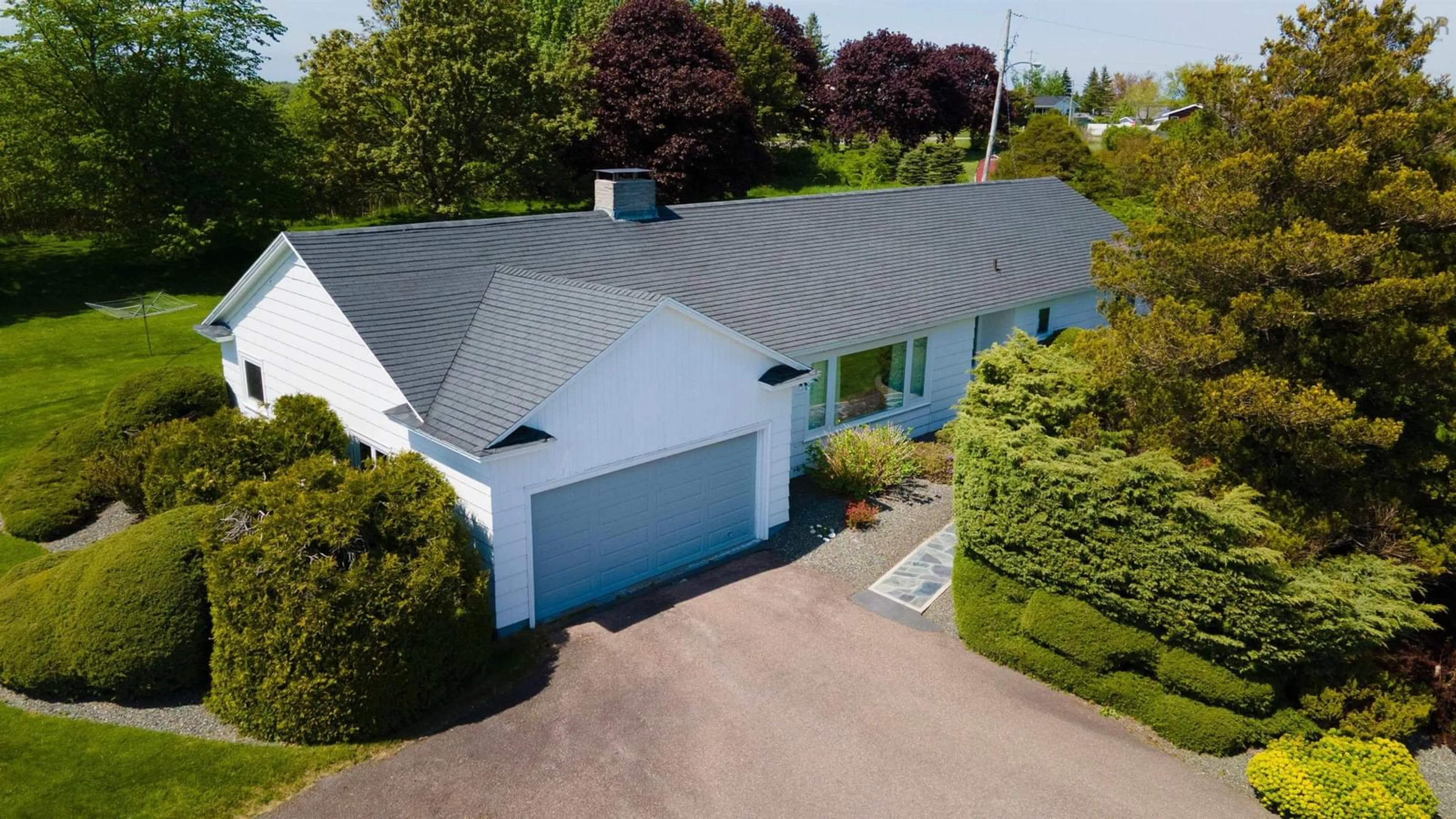 A pic from outside/outdoor area/front of a property/back of a property/a pic from drone, street for 59 Meech Avenue, North Sydney Nova Scotia B2A 1R9