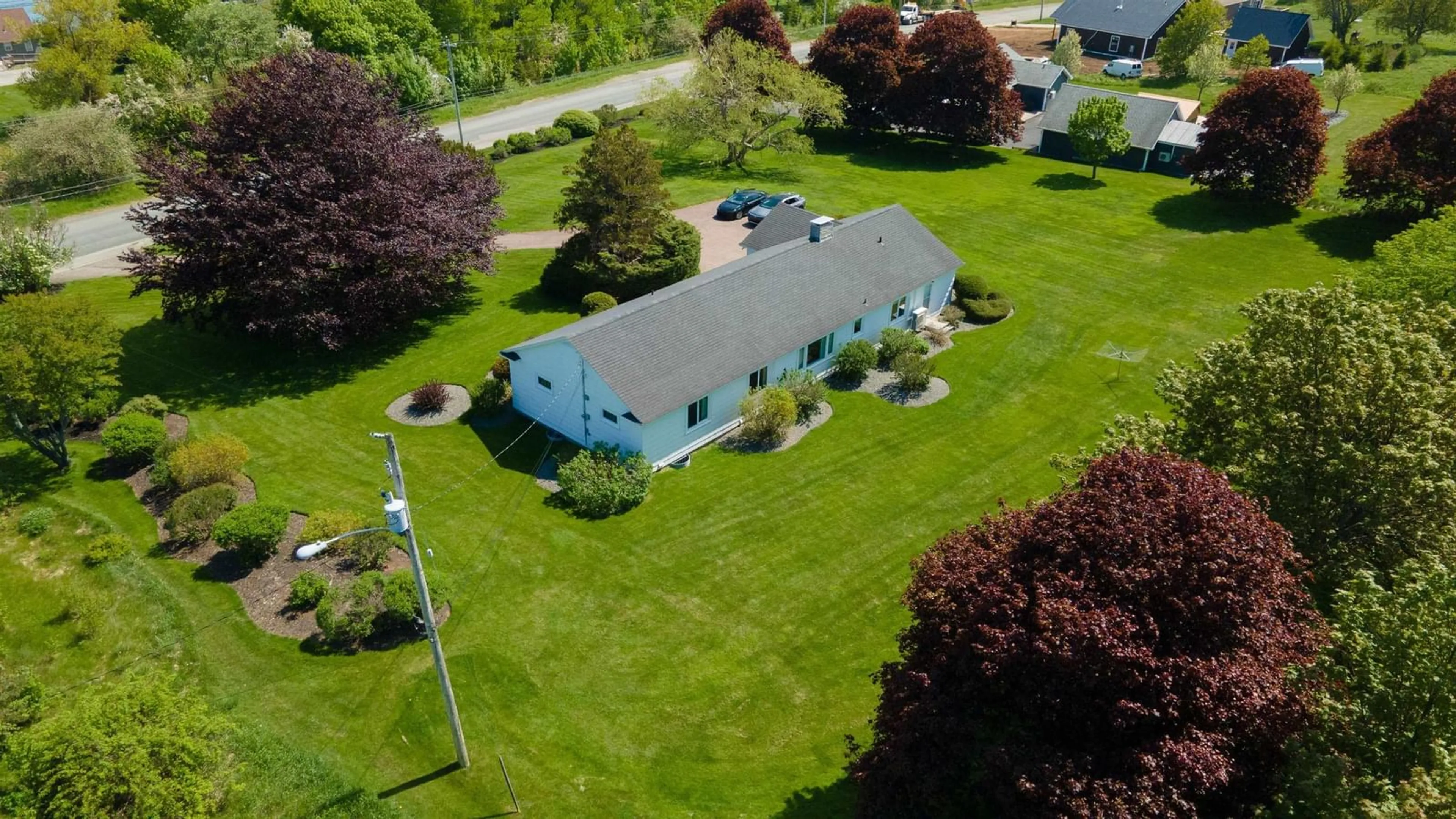 A pic from outside/outdoor area/front of a property/back of a property/a pic from drone, unknown for 59 Meech Avenue, North Sydney Nova Scotia B2A 1R9