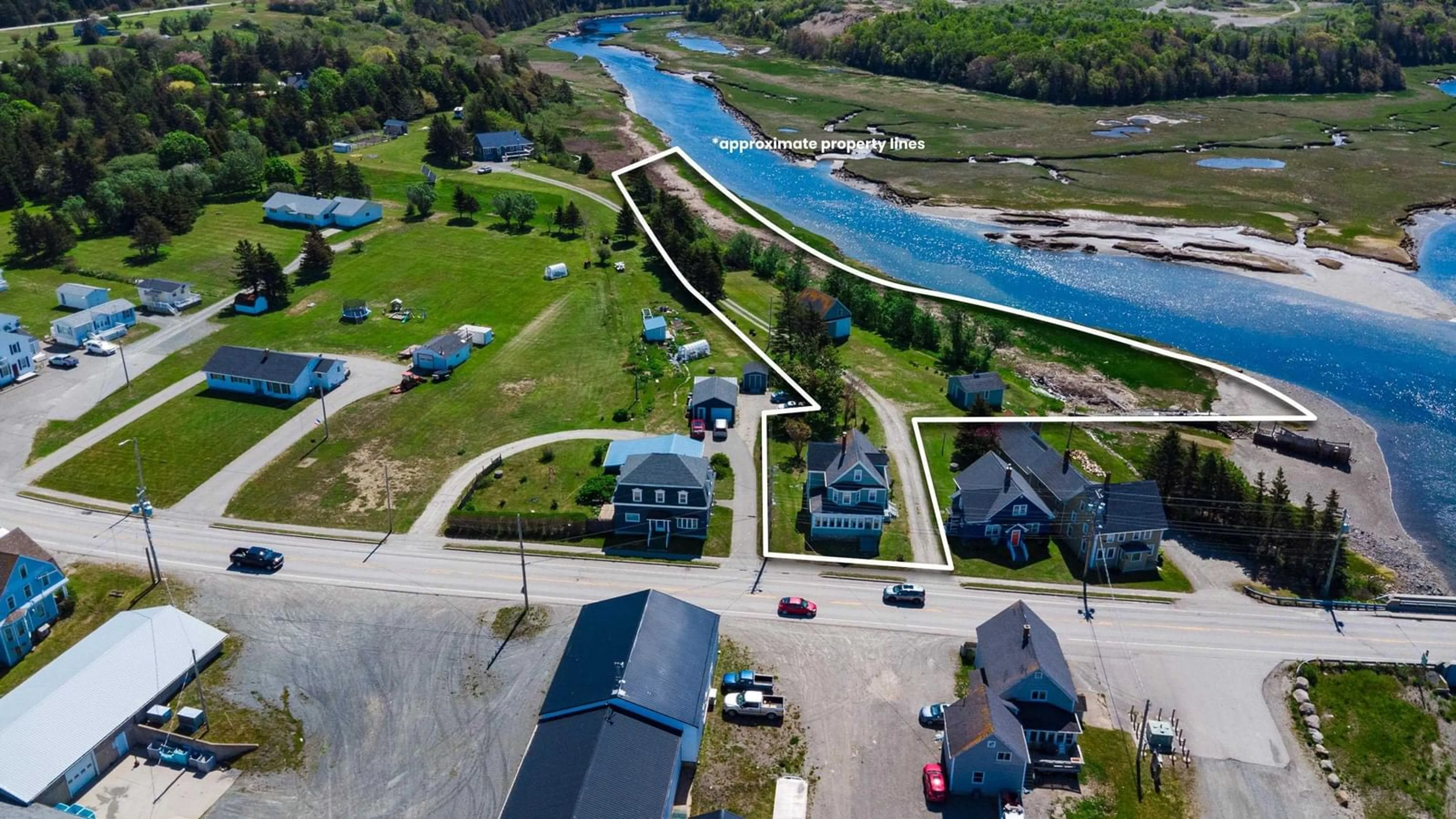 A pic from outside/outdoor area/front of a property/back of a property/a pic from drone, water/lake/river/ocean view for 9086 Highway 1, Meteghan River Nova Scotia B0W 2L0