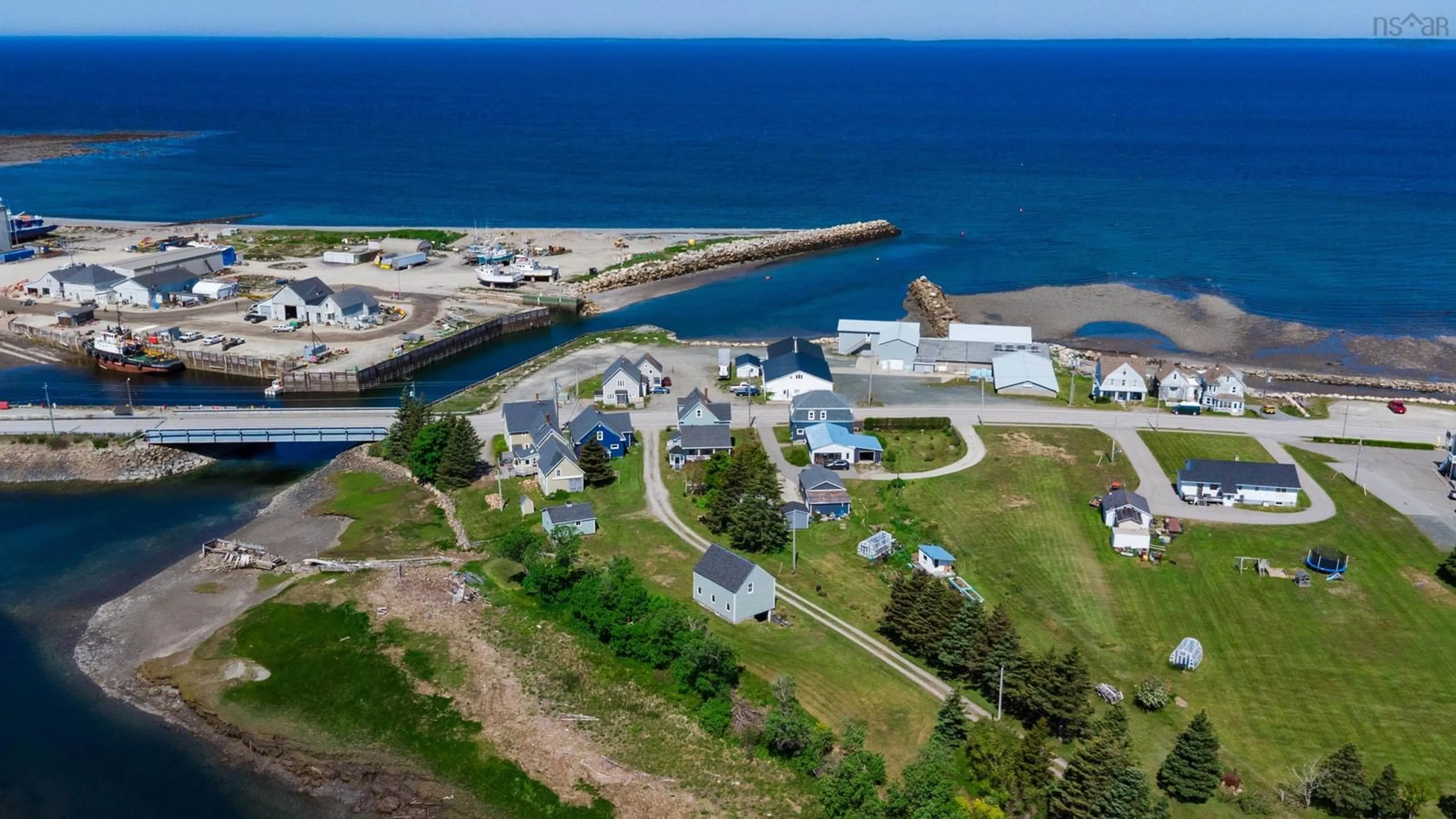 A pic from outside/outdoor area/front of a property/back of a property/a pic from drone, water/lake/river/ocean view for 9086 Highway 1, Meteghan River Nova Scotia B0W 2L0