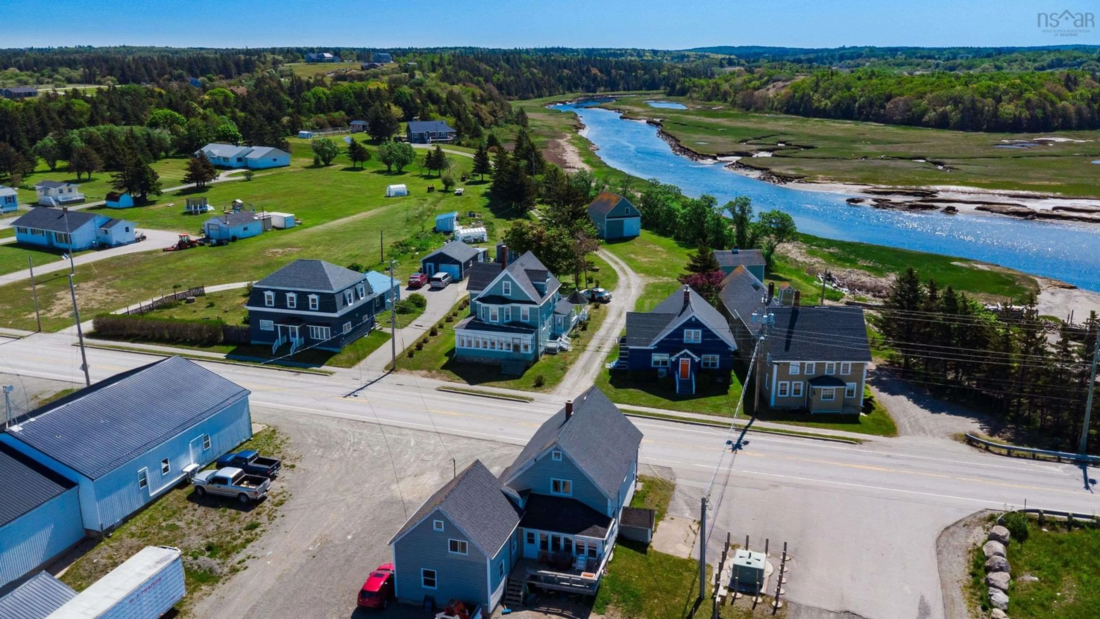 A pic from outside/outdoor area/front of a property/back of a property/a pic from drone, water/lake/river/ocean view for 9086 Highway 1, Meteghan River Nova Scotia B0W 2L0