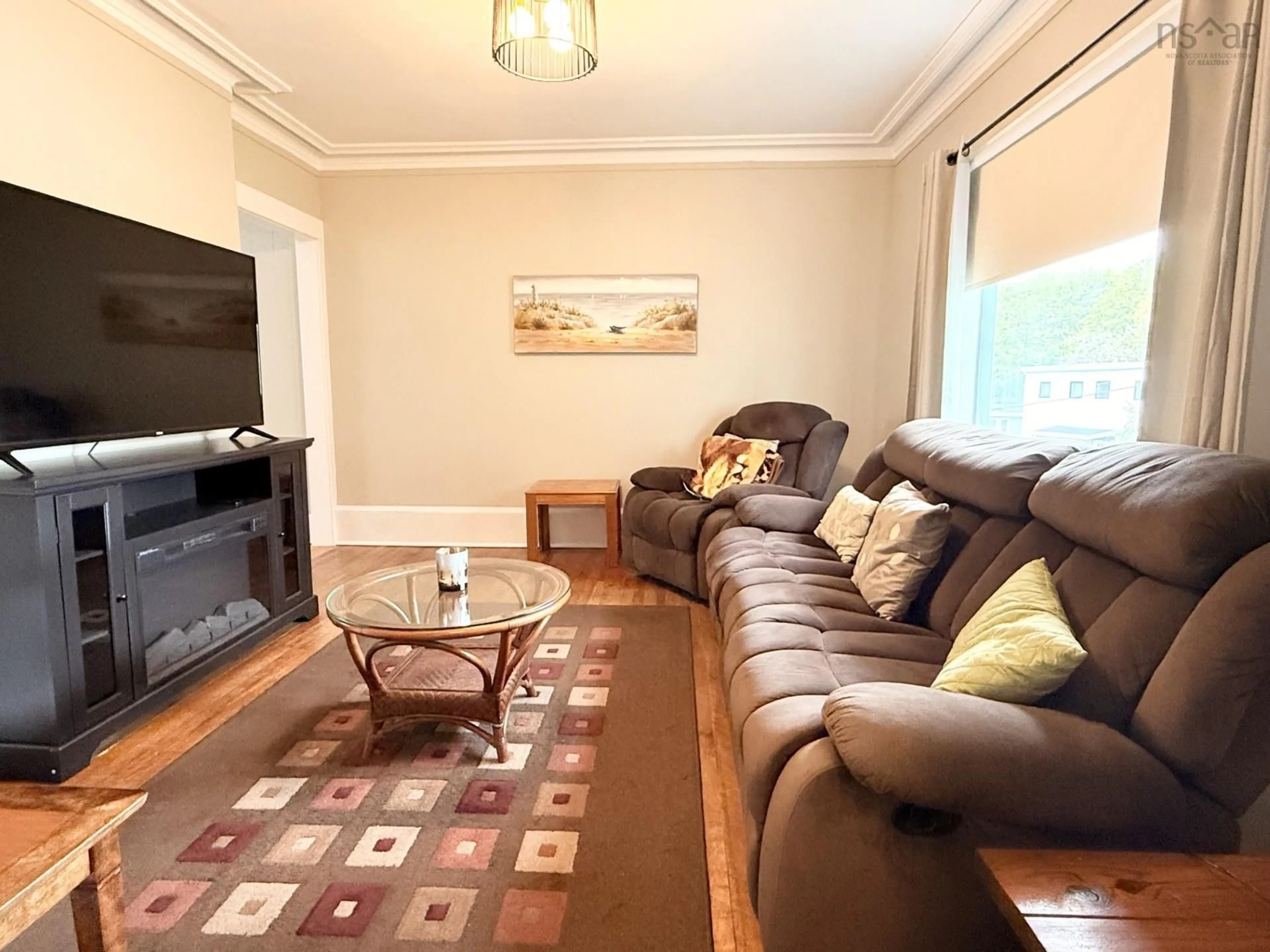Living room with furniture, wood/laminate floor for 14/16 Maynard St, Dartmouth Nova Scotia B2Y 1V9