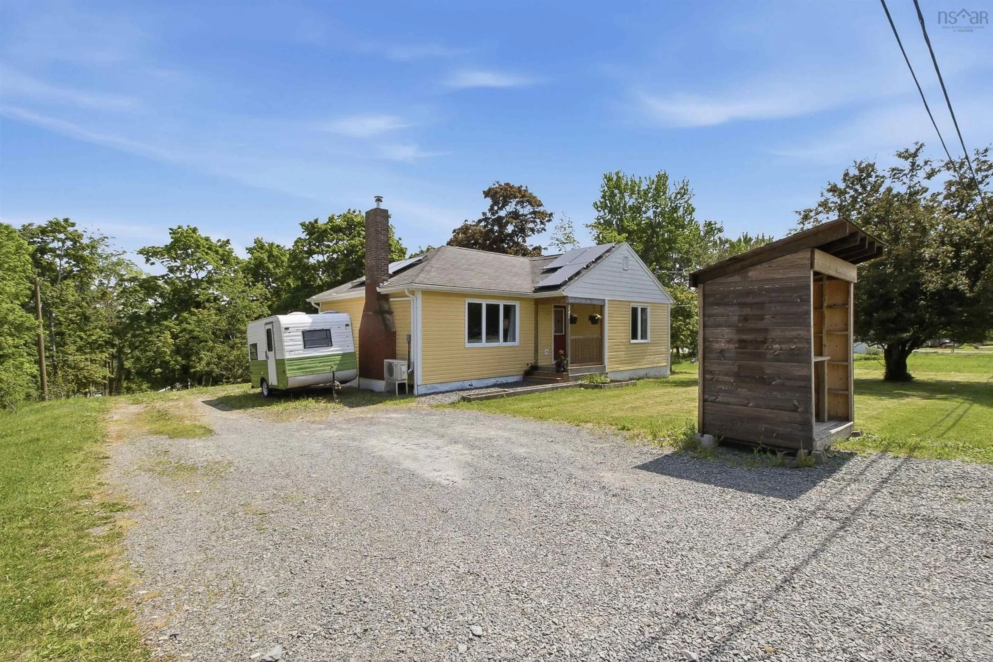 A pic from outside/outdoor area/front of a property/back of a property/a pic from drone, street for 245 Town Rd, Falmouth Nova Scotia B0P 1P0