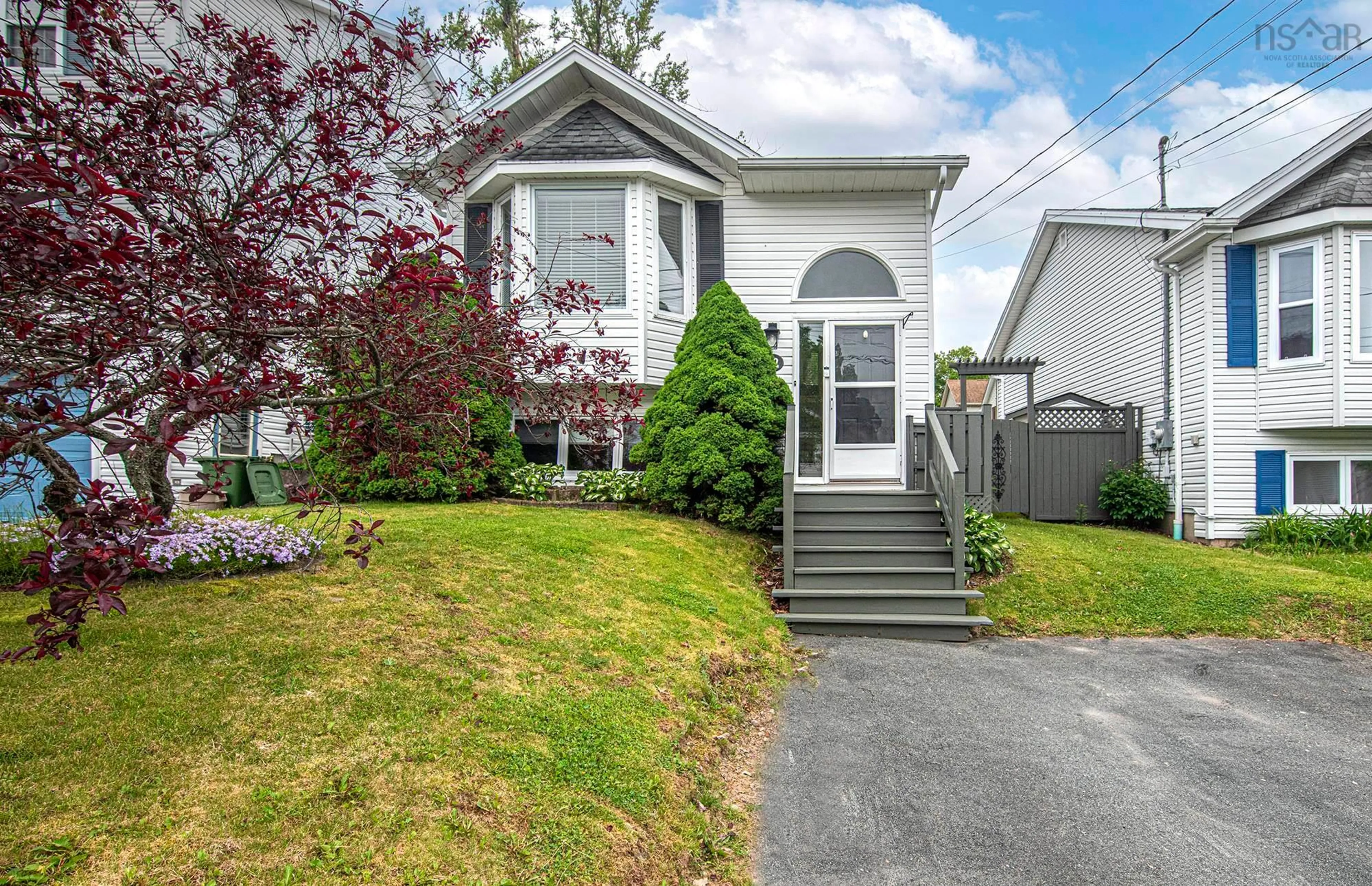 Home with vinyl exterior material, street for 22 Haddad Dr, Lower Sackville Nova Scotia B4C 4A7