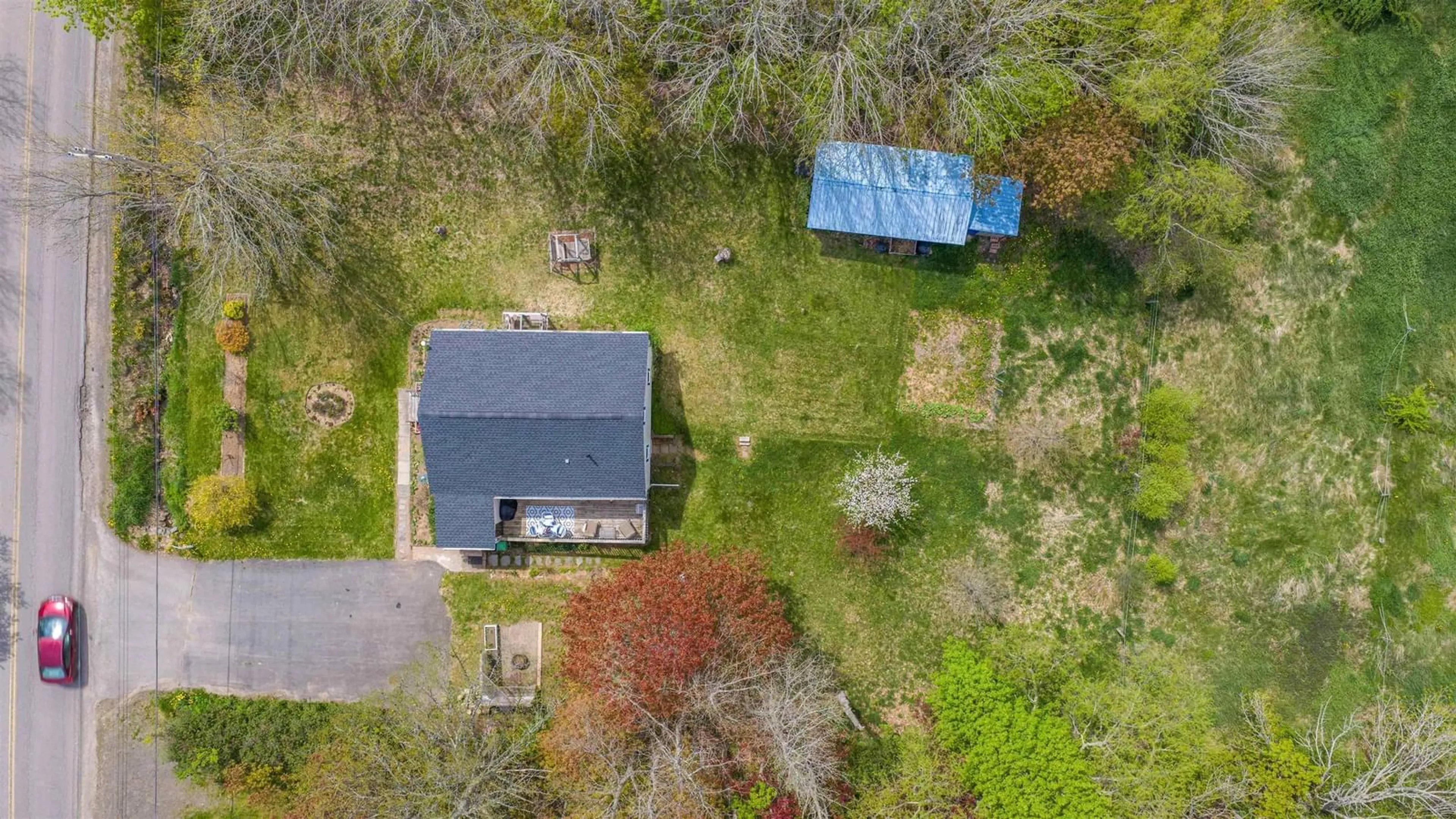 A pic from outside/outdoor area/front of a property/back of a property/a pic from drone, street for 1305 Ridge Rd, Wolfville Ridge Nova Scotia B4P 2R1