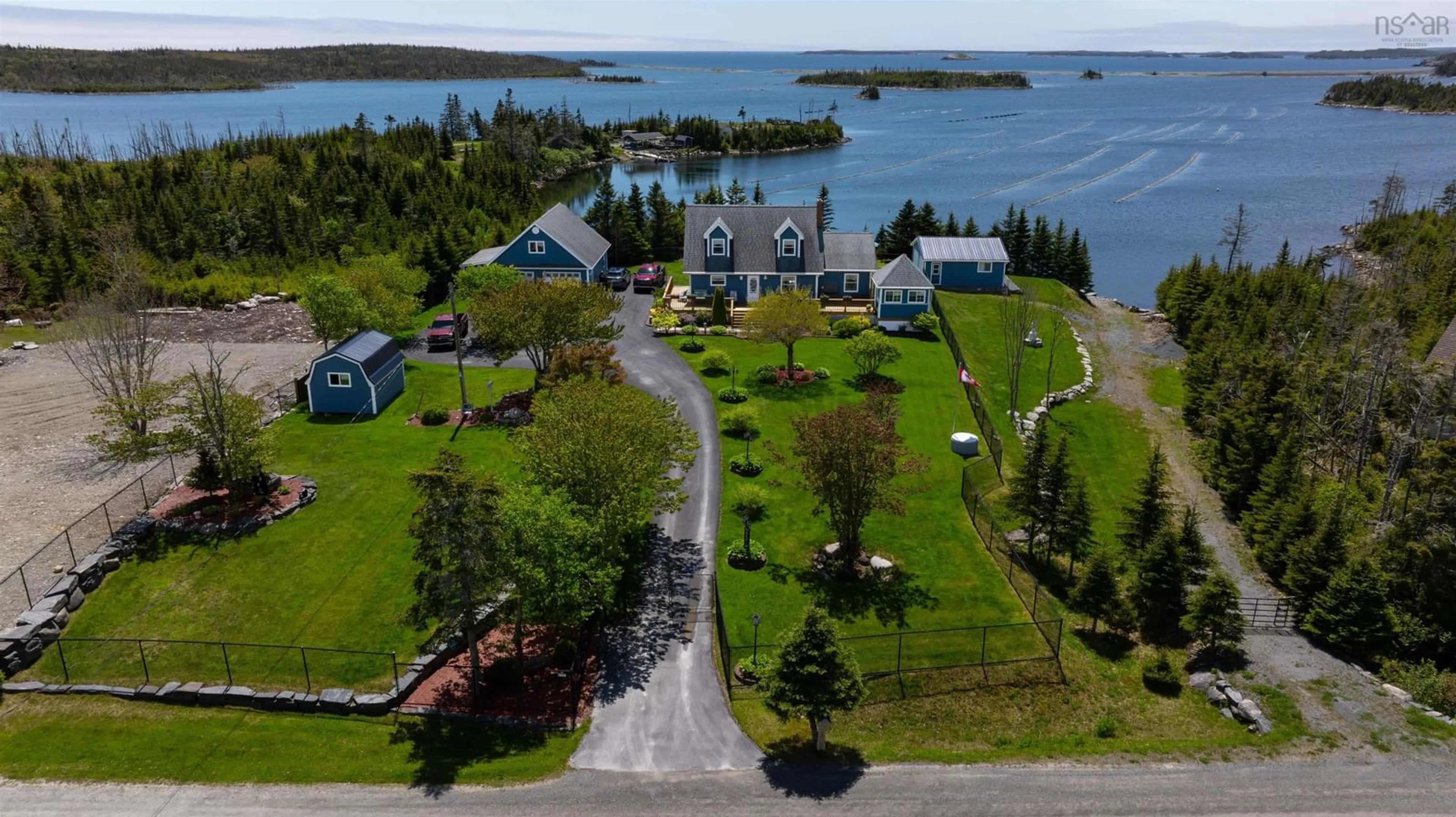 A pic from outside/outdoor area/front of a property/back of a property/a pic from drone, water/lake/river/ocean view for 62 Mozier Cove Rd, Sober Island Nova Scotia B0J 3B0