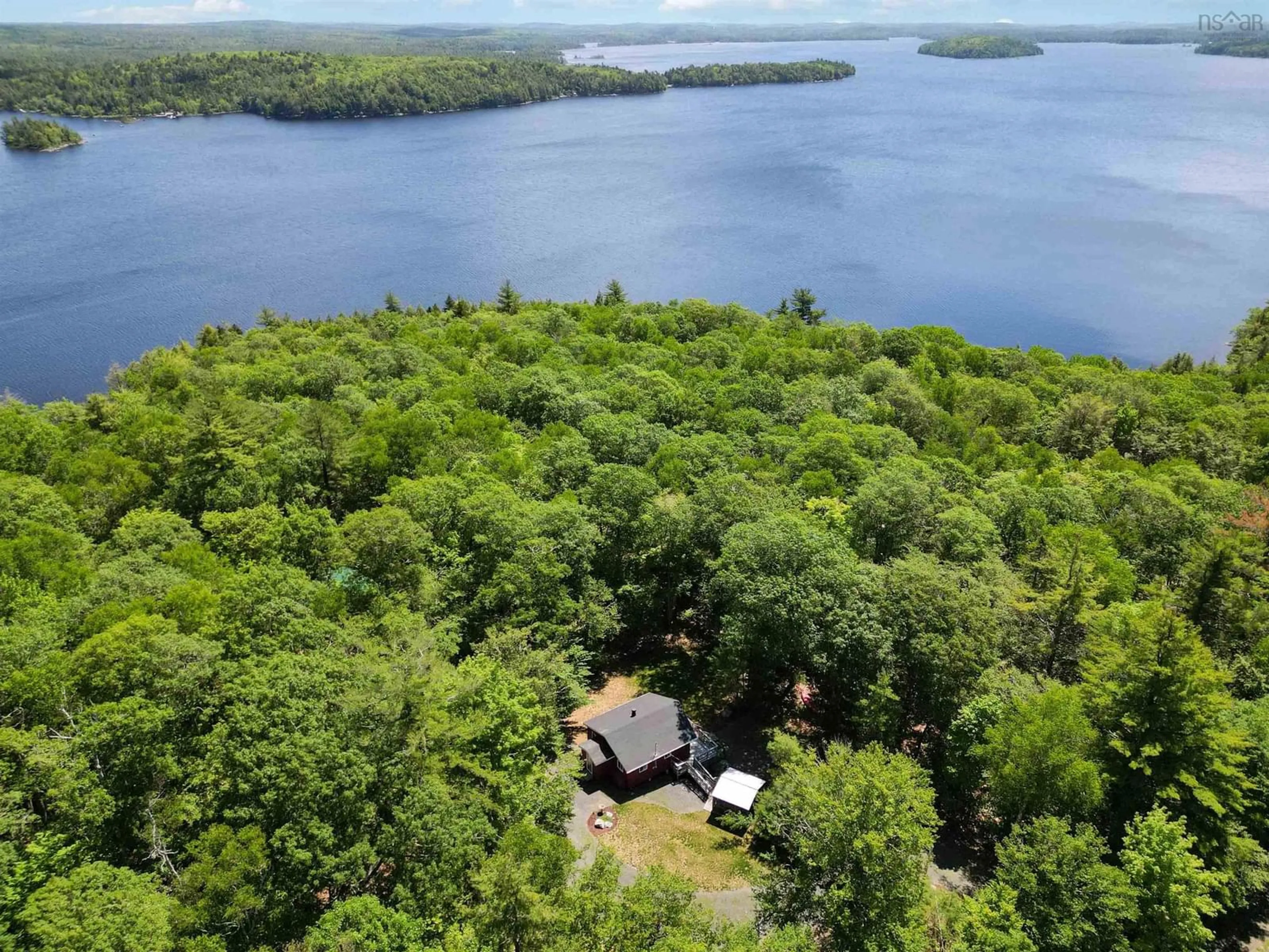 A pic from outside/outdoor area/front of a property/back of a property/a pic from drone, water/lake/river/ocean view for 59 Beach Cove Ptway, Molega North Nova Scotia B0T 1X0
