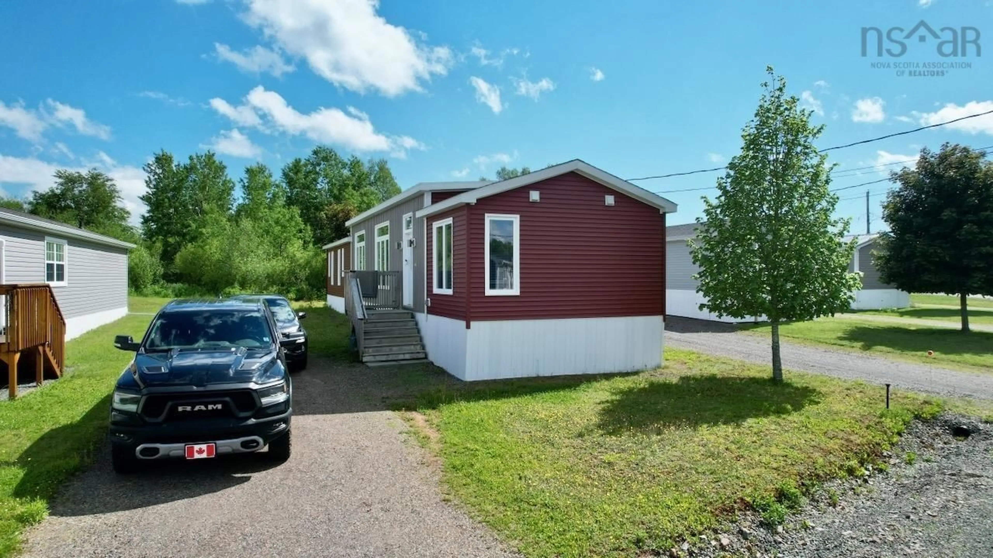 Home with vinyl exterior material, street for 32 Joseph Dr, Bible Hill Nova Scotia B2N 0G4