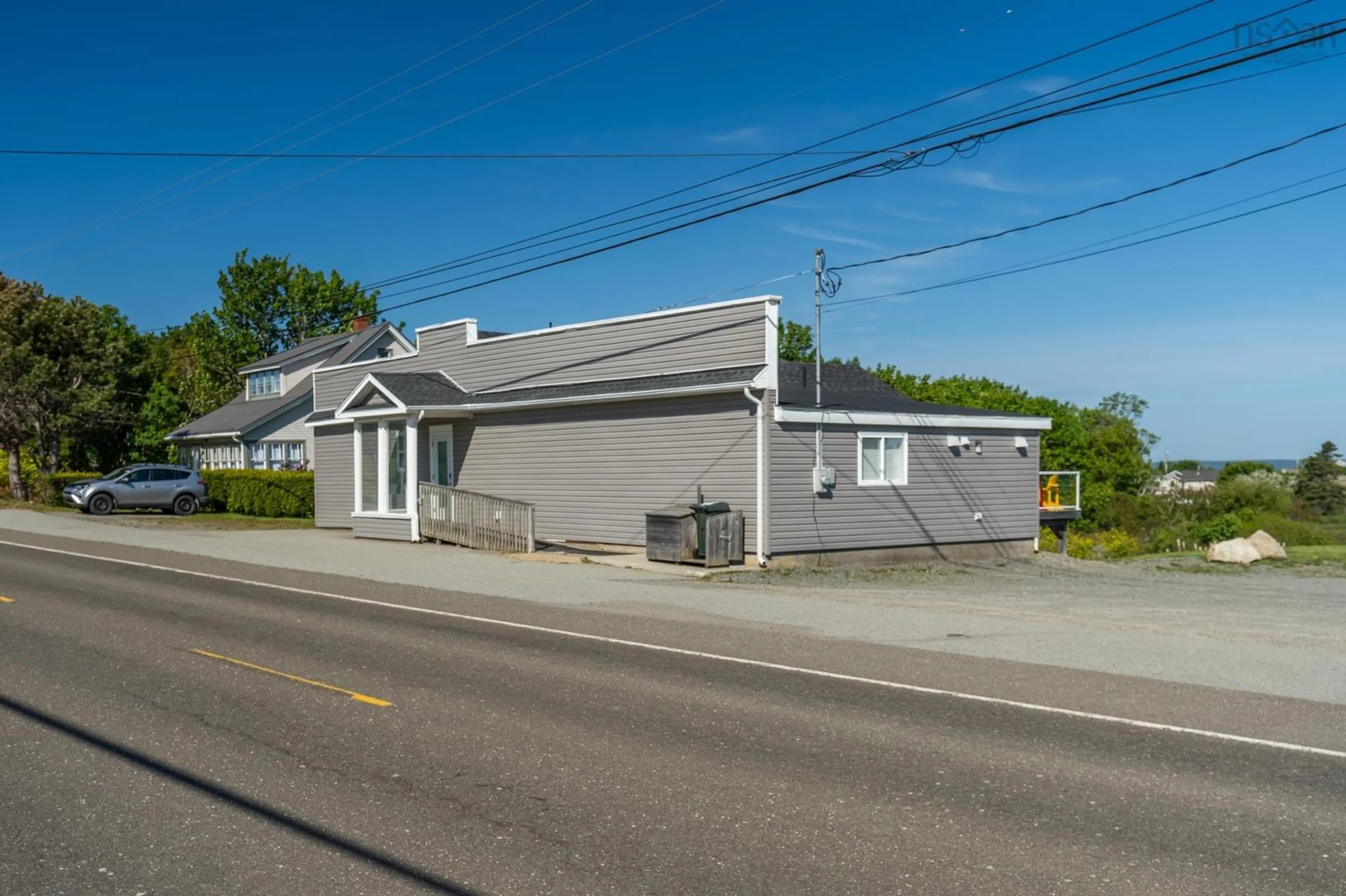 A pic from outside/outdoor area/front of a property/back of a property/a pic from drone, street for 1861 Highway 1, Church Point Nova Scotia B0W 1M0