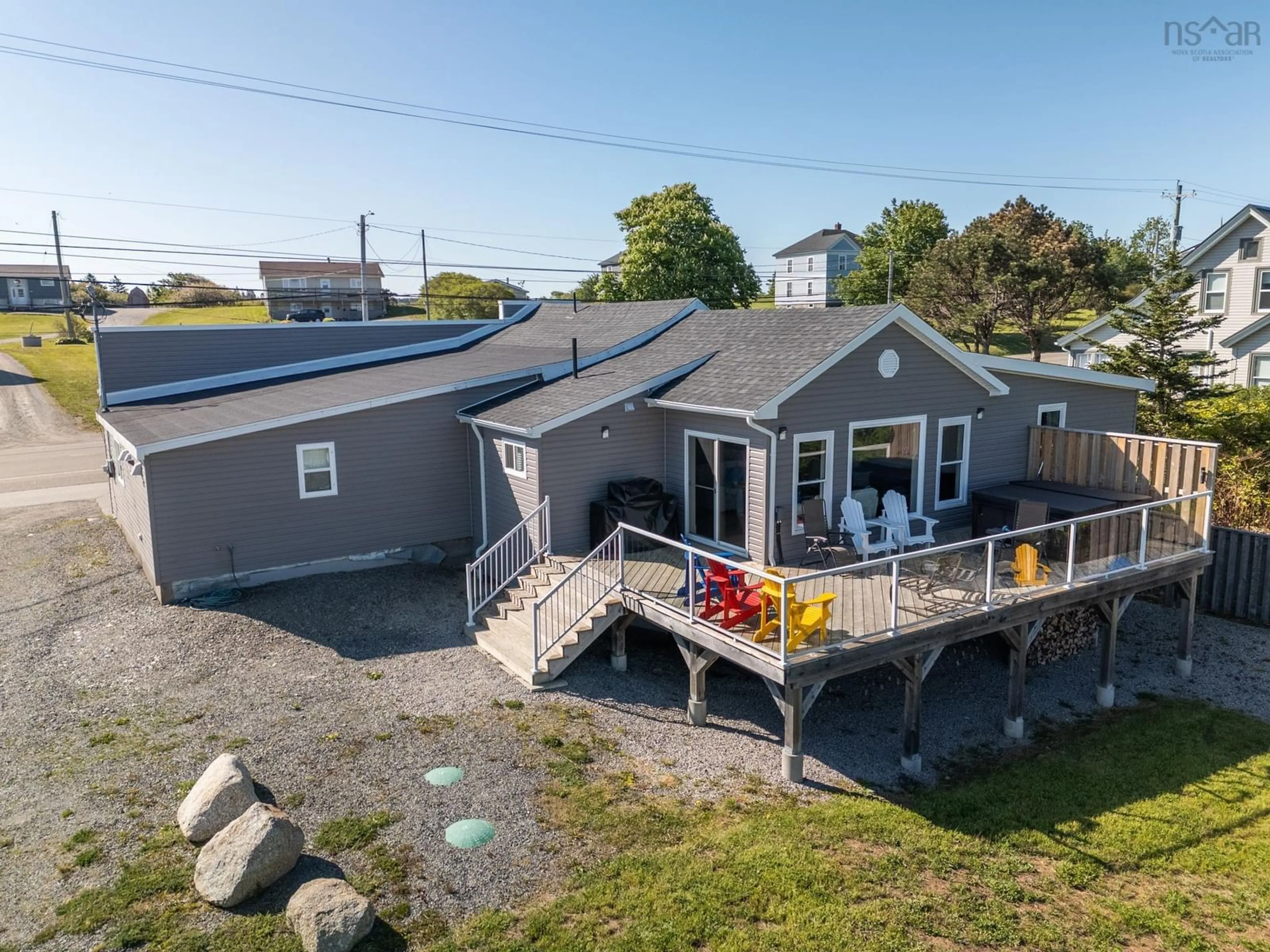 A pic from outside/outdoor area/front of a property/back of a property/a pic from drone, water/lake/river/ocean view for 1861 Highway 1, Church Point Nova Scotia B0W 1M0