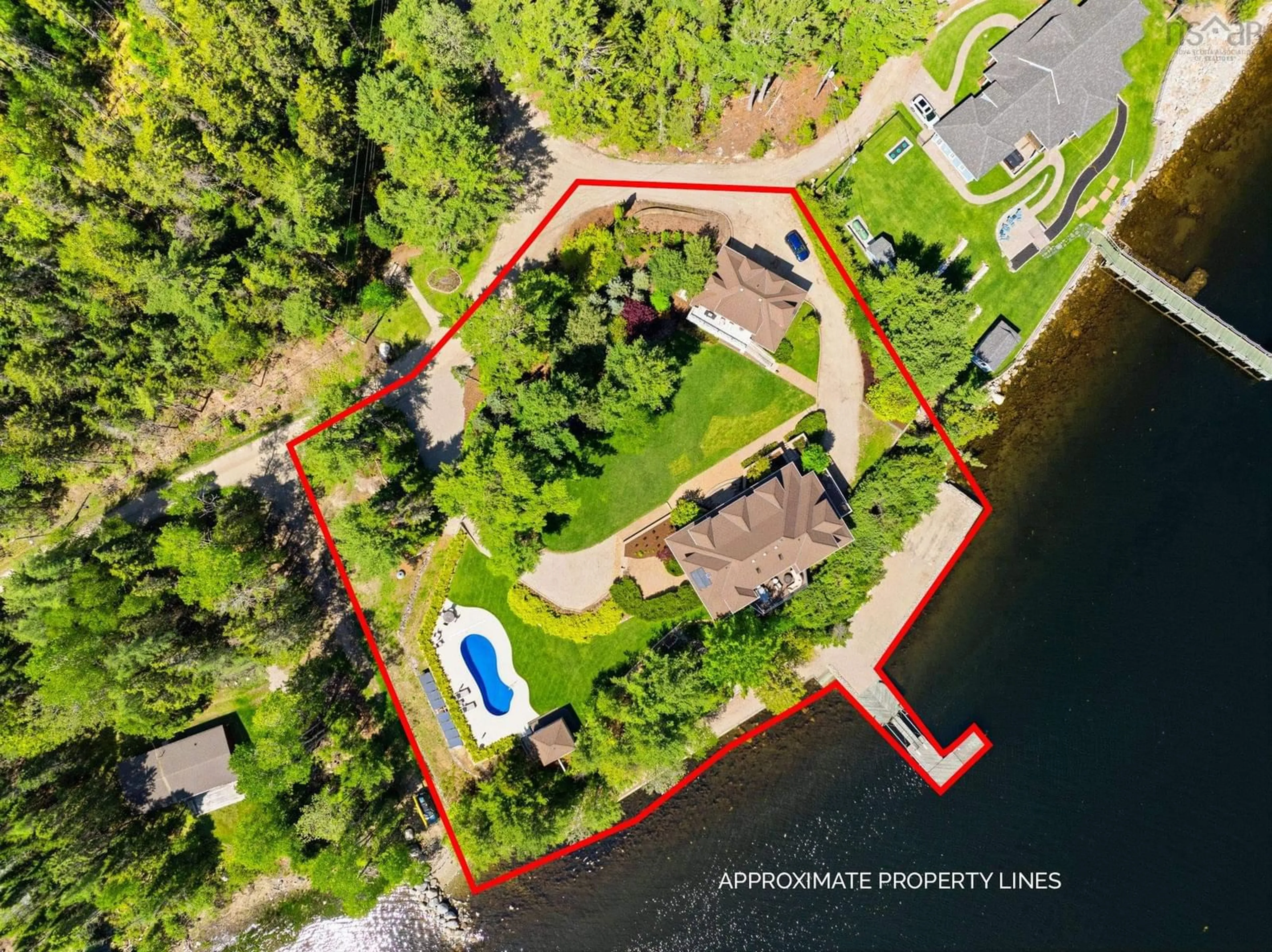 A pic from outside/outdoor area/front of a property/back of a property/a pic from drone, water/lake/river/ocean view for 6 Mary Lane, Chester Basin Nova Scotia B0J 1K0