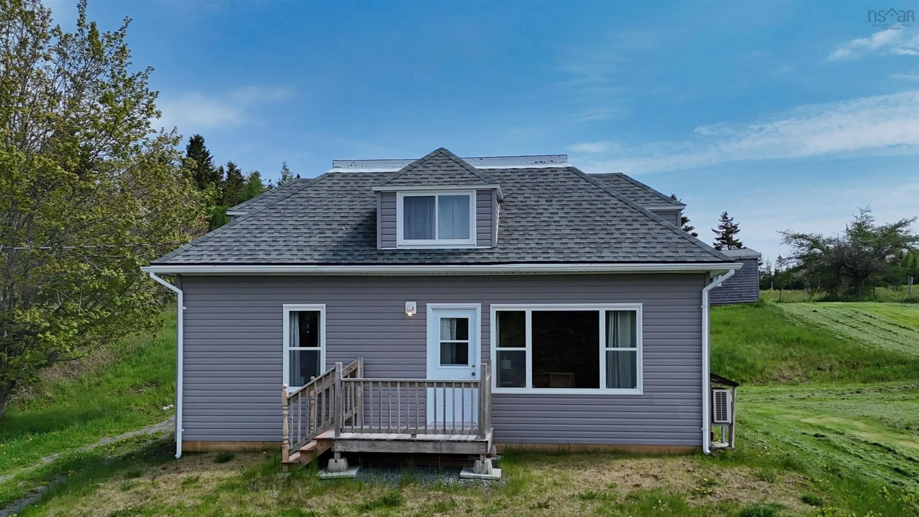 Home with vinyl exterior material, building for 50 Riverview Dr, River Bourgeois Nova Scotia B0E 2X0