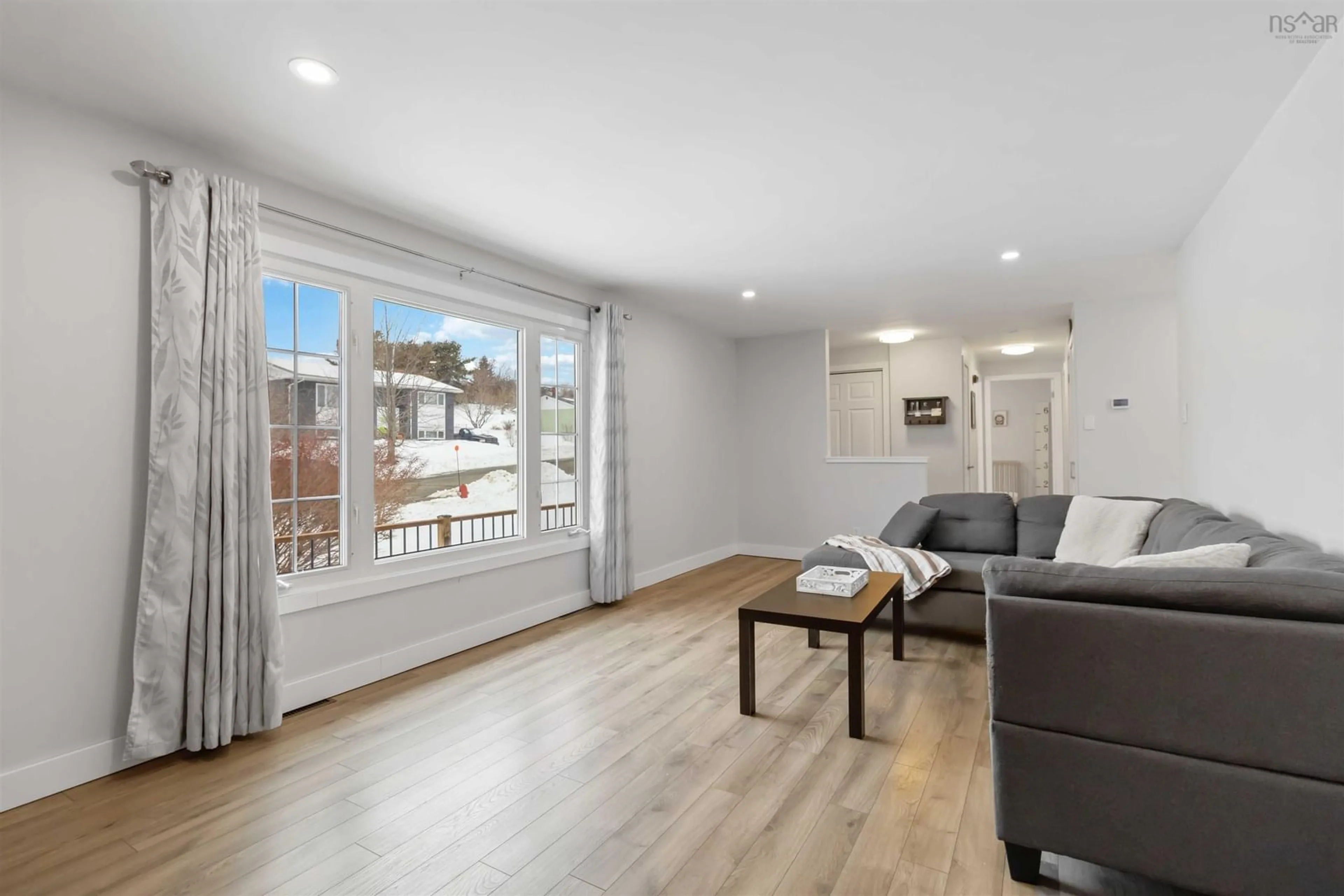Living room with furniture, wood/laminate floor for 171 Centennial Ave, Lunenburg Nova Scotia B0J 2C0