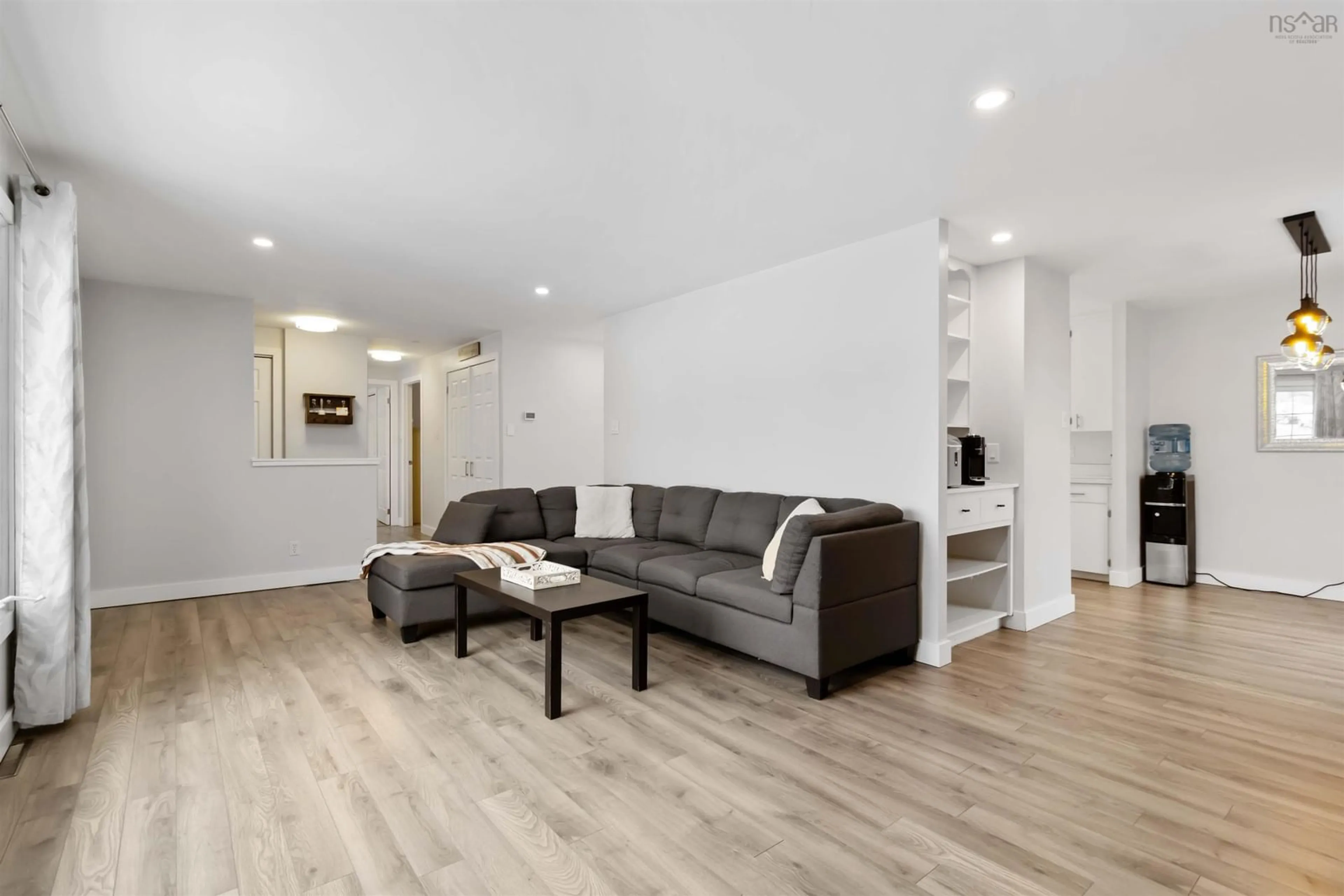 Living room with furniture, wood/laminate floor for 171 Centennial Ave, Lunenburg Nova Scotia B0J 2C0