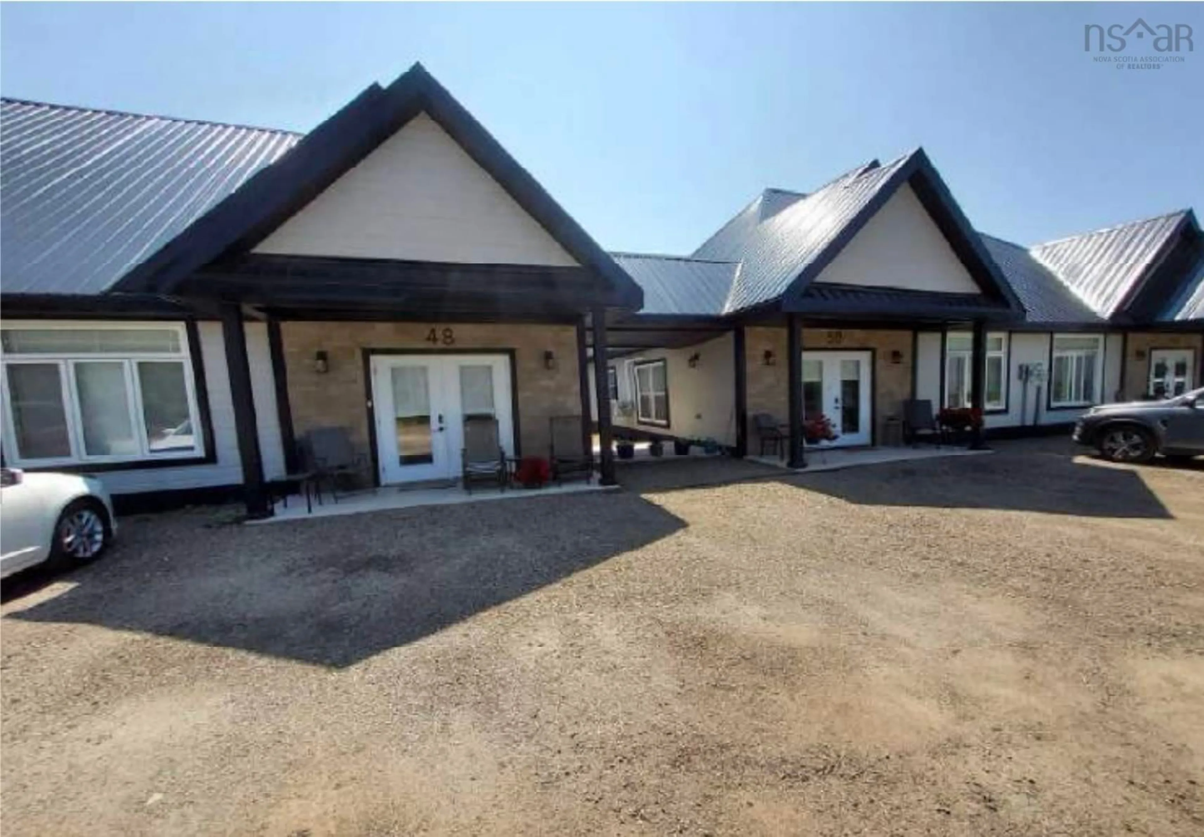 A pic from outside/outdoor area/front of a property/back of a property/a pic from drone, building for 46-52 Chemin Venette Rd, Chéticamp Nova Scotia B0E 1H0