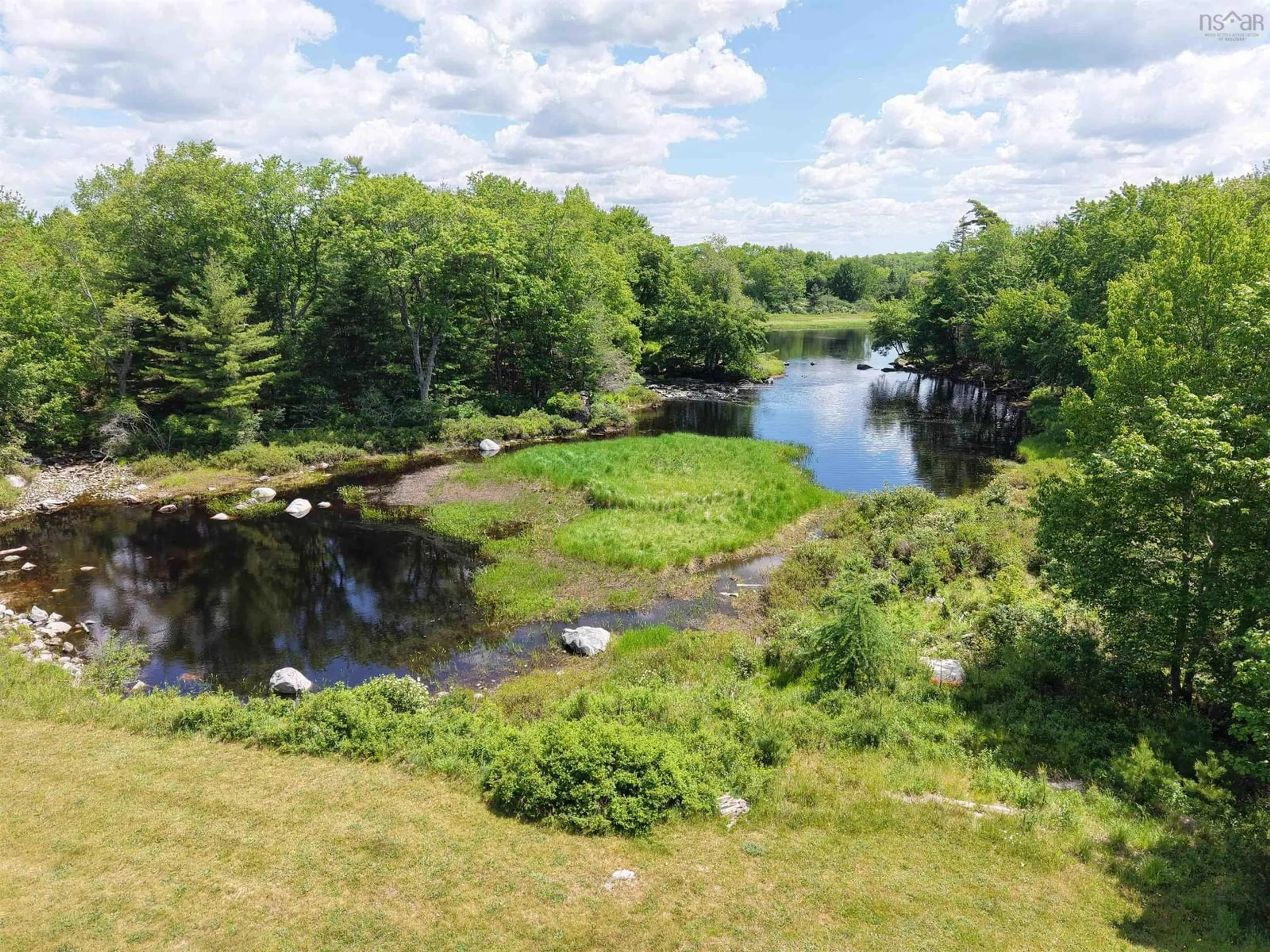 A pic from outside/outdoor area/front of a property/back of a property/a pic from drone, water/lake/river/ocean view for 4184 203 Hwy, Middle Ohio Nova Scotia B0T 1W0