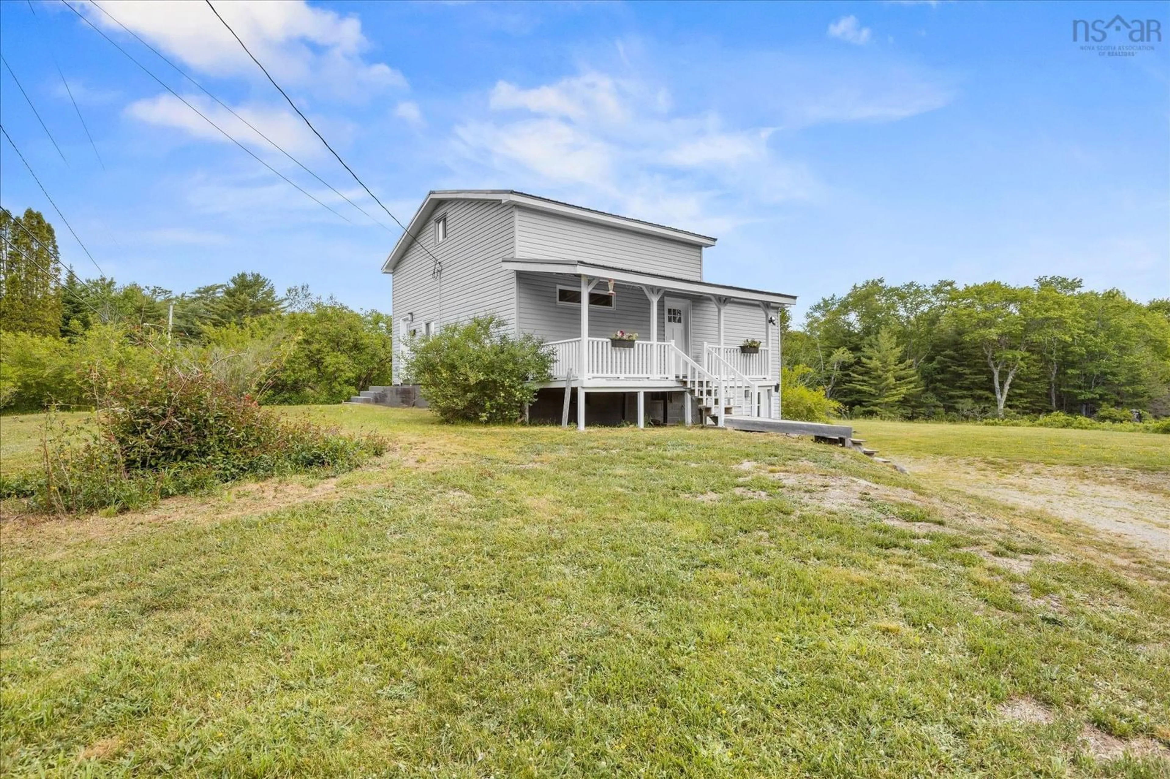 A pic from outside/outdoor area/front of a property/back of a property/a pic from drone, water/lake/river/ocean view for 4184 203 Hwy, Middle Ohio Nova Scotia B0T 1W0