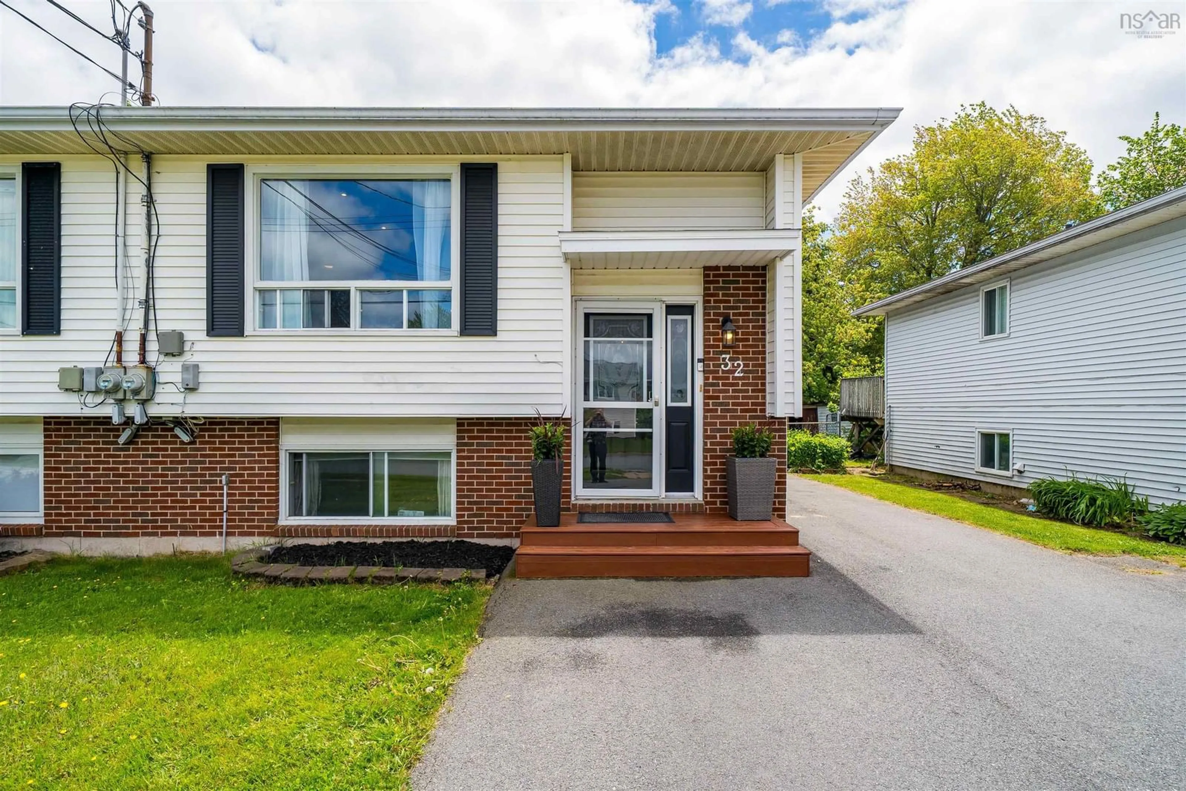 Home with vinyl exterior material, street for 32 Merrimac Dr, Cole Harbour Nova Scotia B2W 4P8