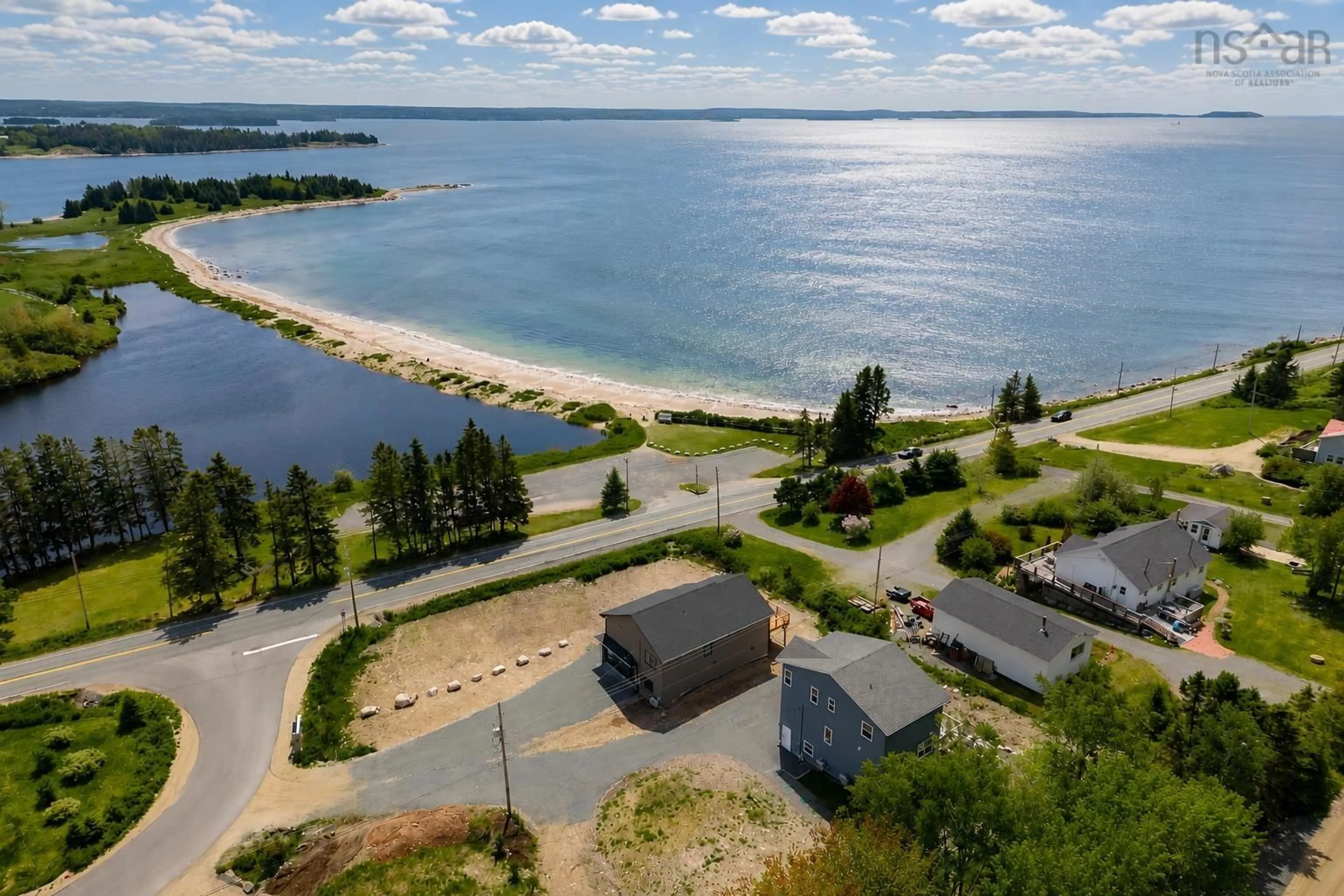 A pic from outside/outdoor area/front of a property/back of a property/a pic from drone, water/lake/river/ocean view for 4 Brigleys Rd, Queensland Nova Scotia B0J 1T0