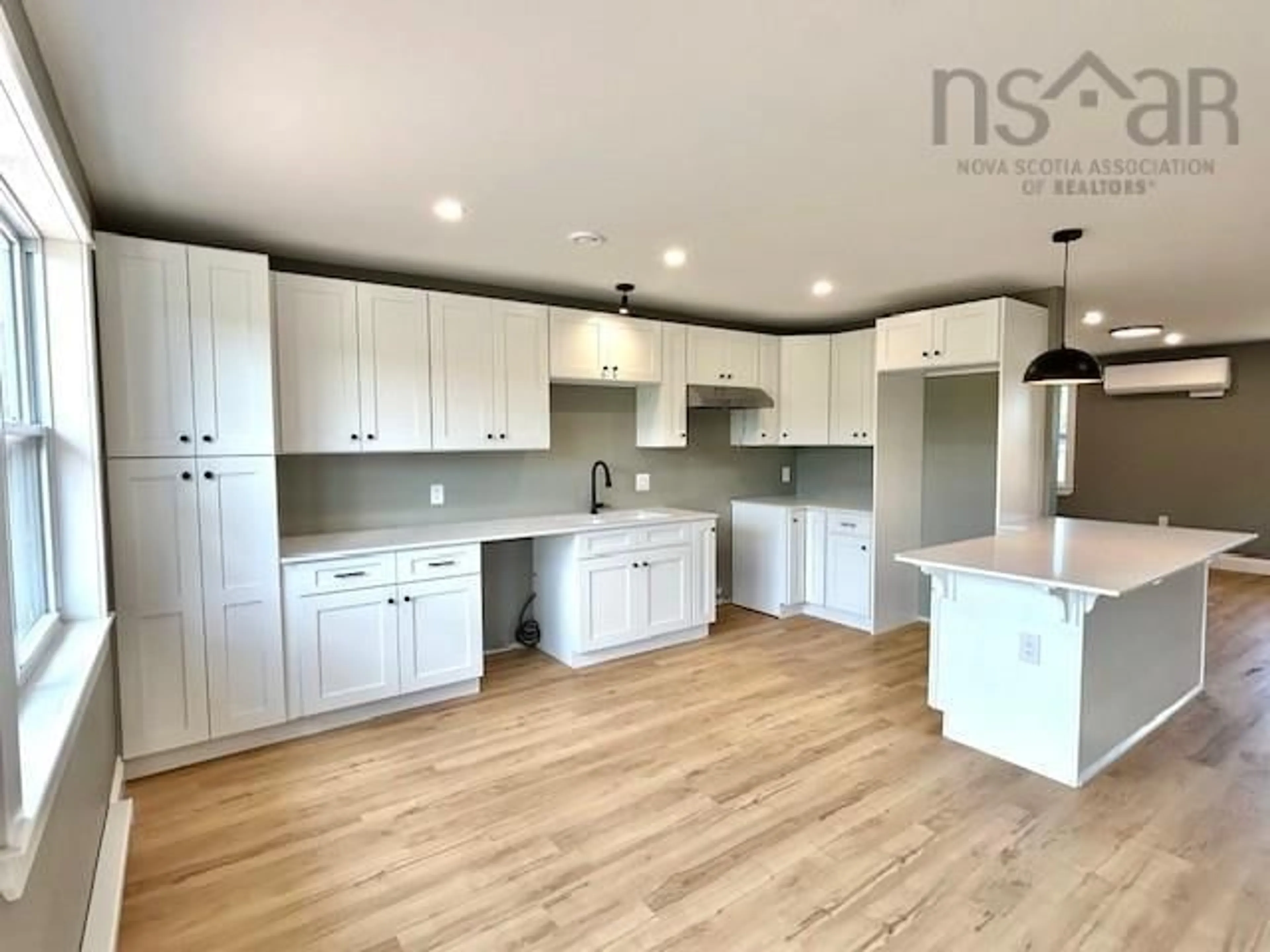 Open concept kitchen, wood/laminate floor for 1930 Meadowvale Rd, Upper Stewiacke Nova Scotia B0N 2P0