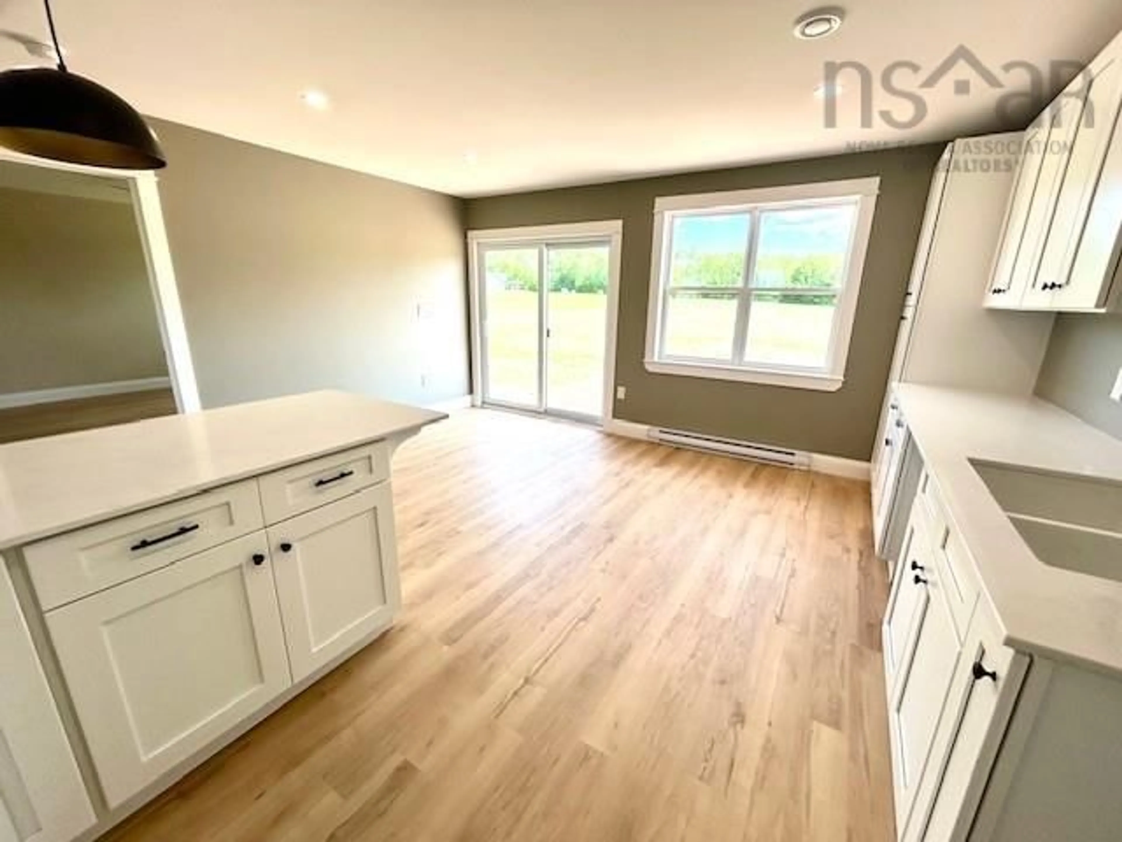 Open concept kitchen, wood/laminate floor for 1930 Meadowvale Rd, Upper Stewiacke Nova Scotia B0N 2P0