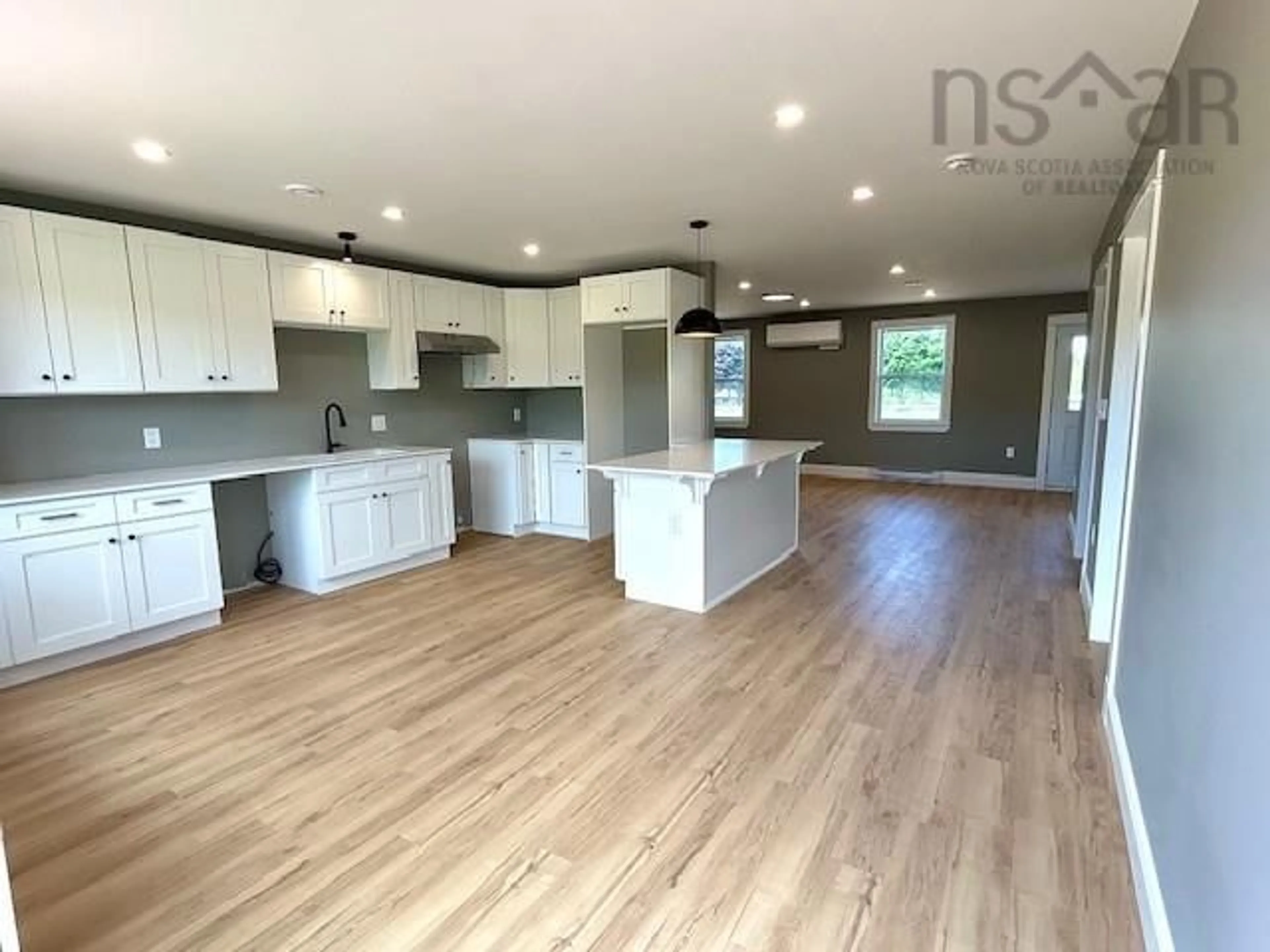 Open concept kitchen, wood/laminate floor for 1930 Meadowvale Rd, Upper Stewiacke Nova Scotia B0N 2P0