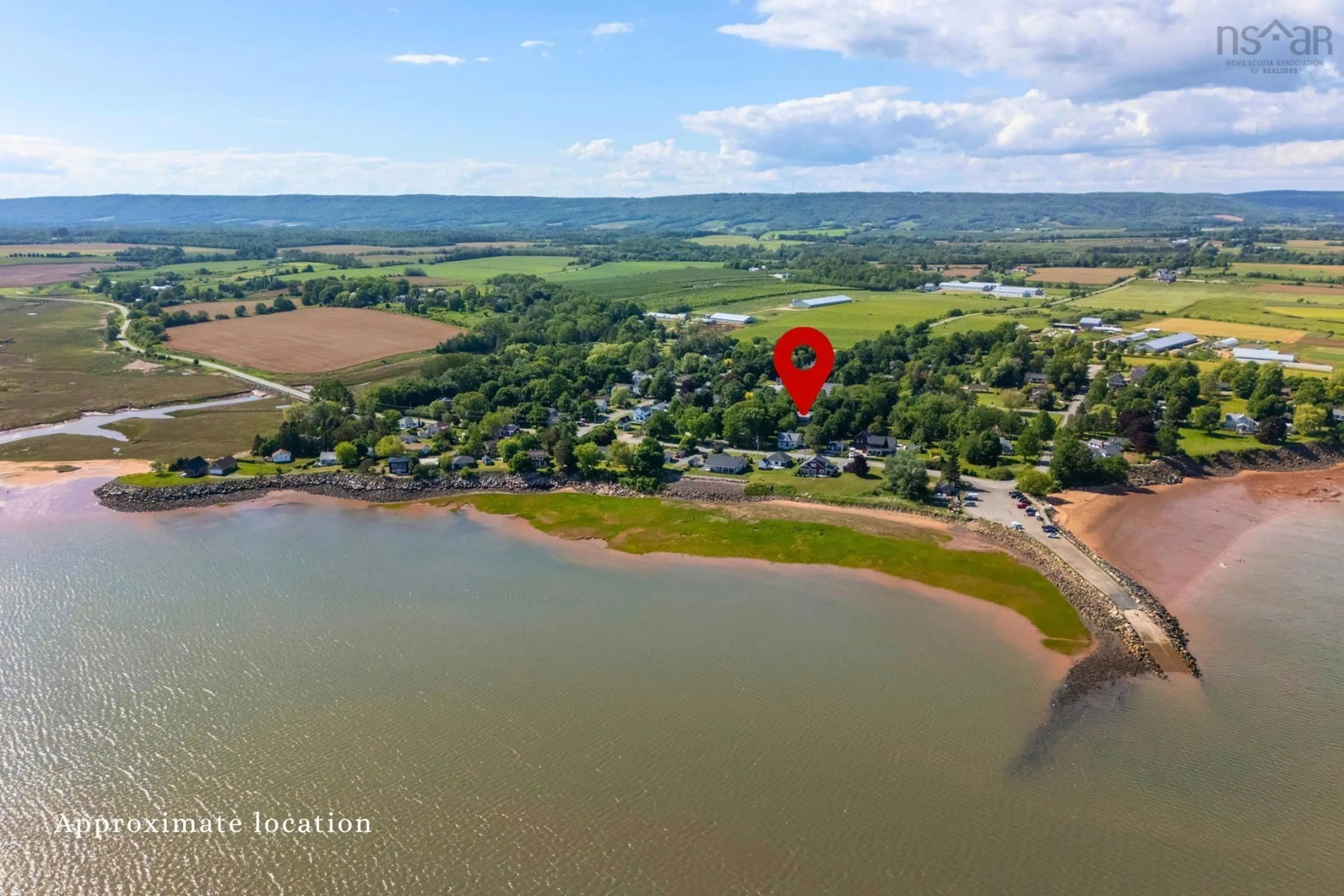 A pic from outside/outdoor area/front of a property/back of a property/a pic from drone, water/lake/river/ocean view for 14 Main St, Kingsport Nova Scotia B0P 1H0