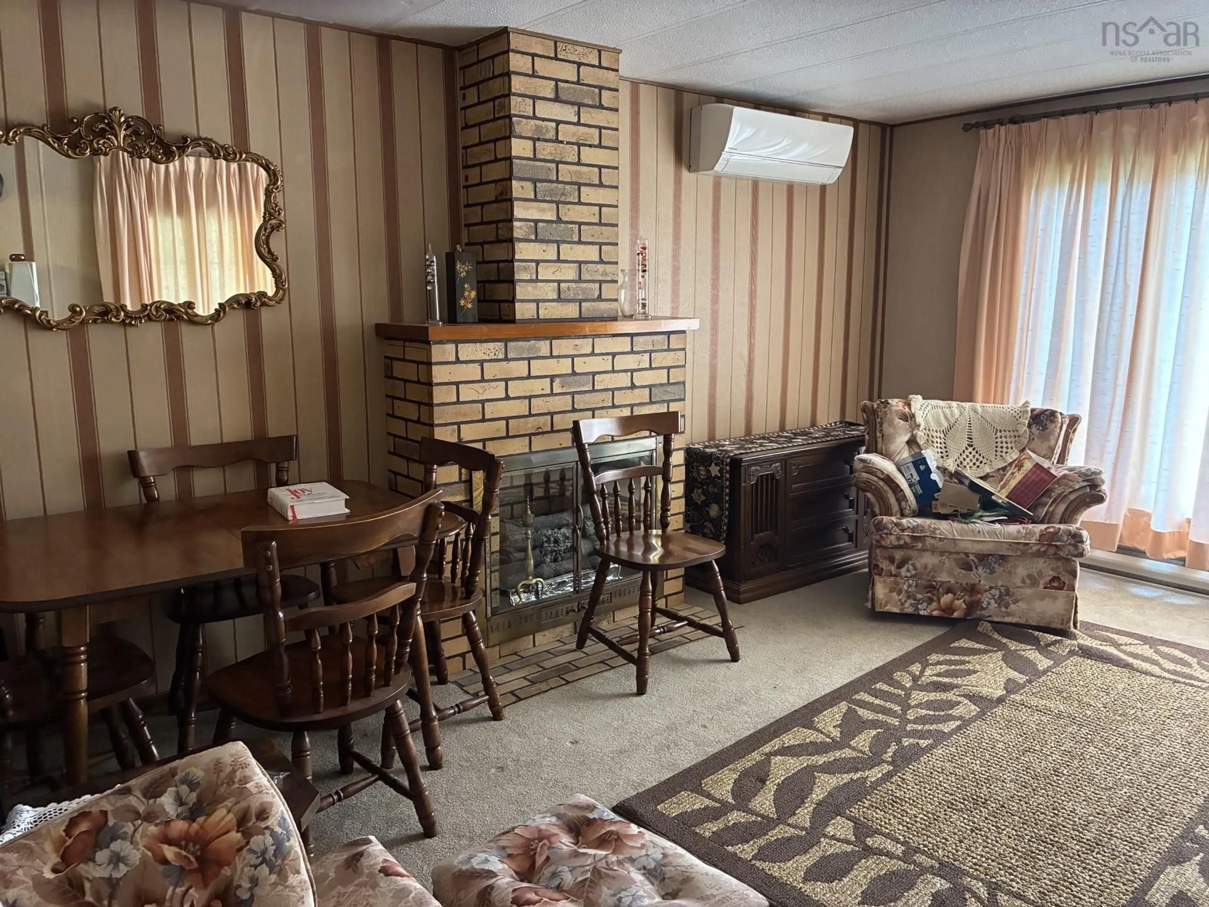 Living room with furniture, unknown for 178 Twining, Baddeck Nova Scotia B0E 1B0