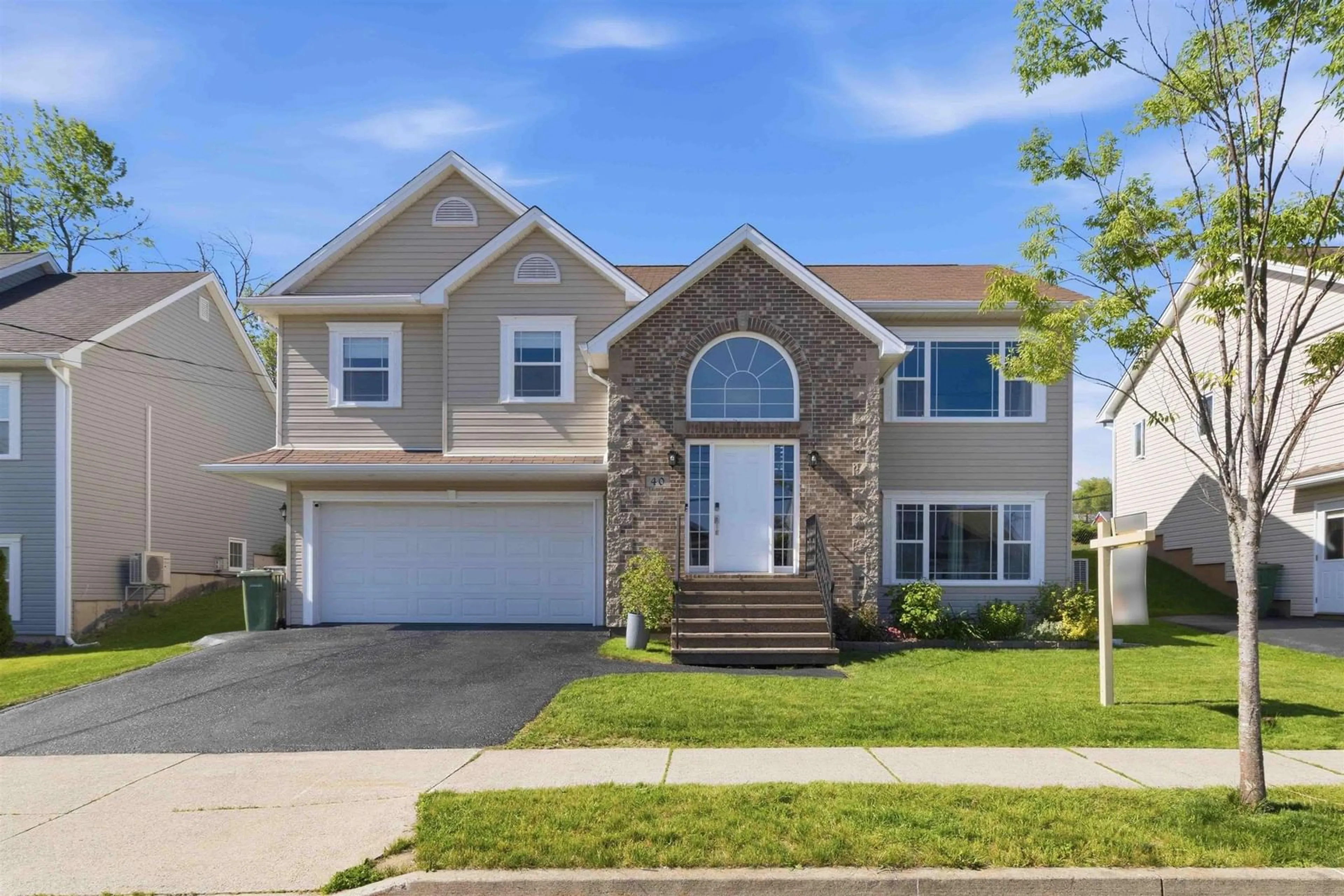 Home with vinyl exterior material, street for 40 Baker Dr, Middle Sackville Nova Scotia B4E 1V1